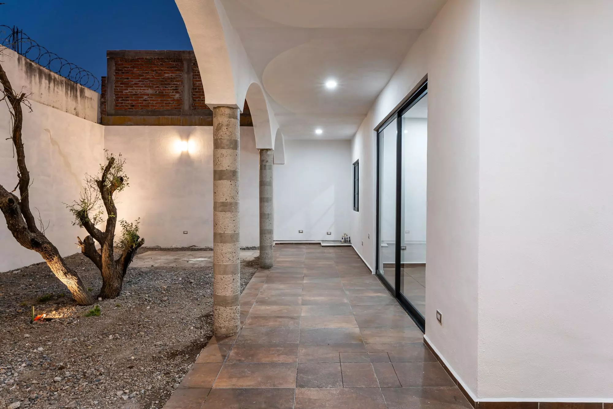 Casa Albor — La Palmita, San Miguel de Allende — photo 24 — contemporary covered gallery, serene courtyard