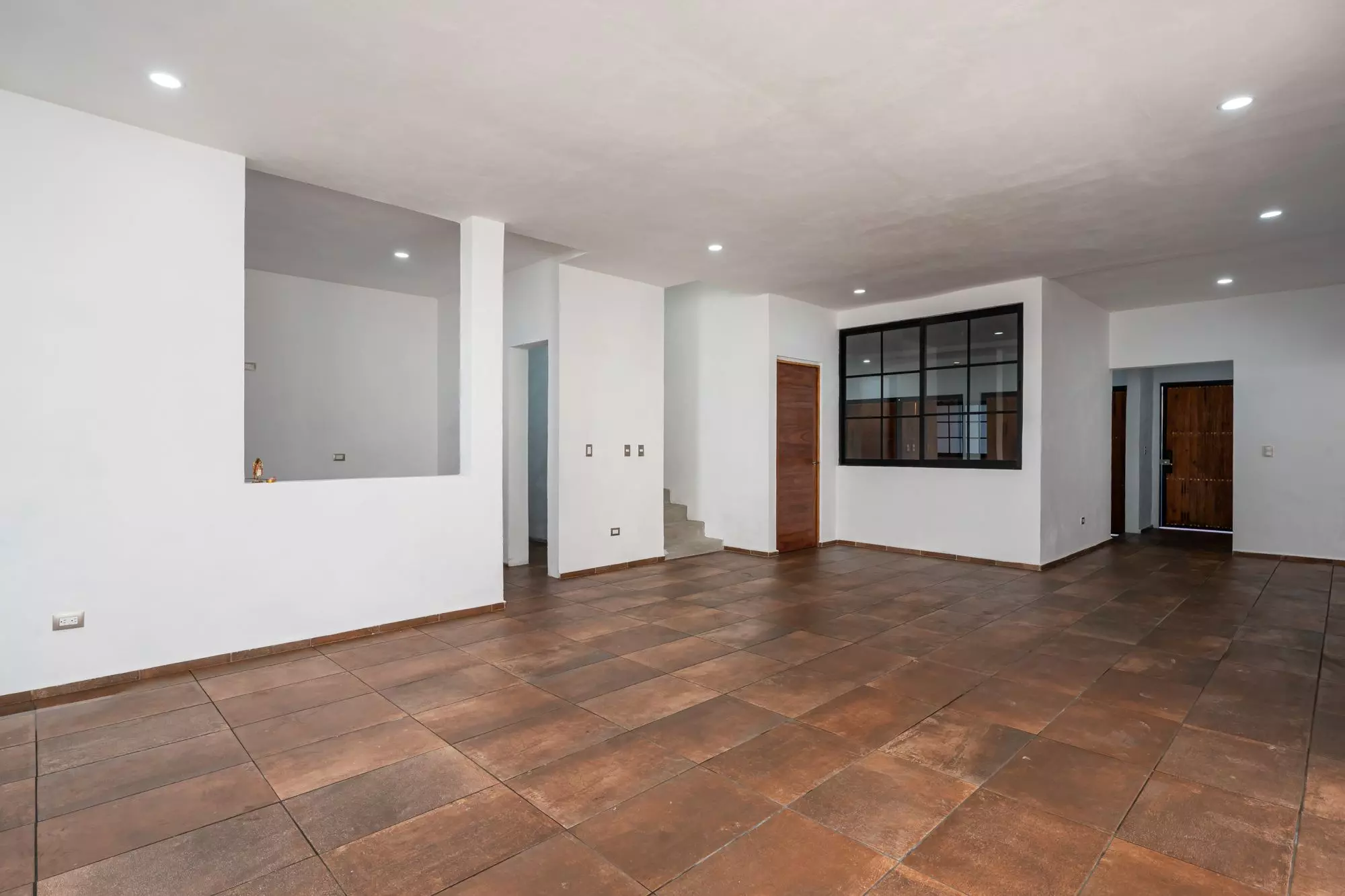 Casa Albor — La Palmita, San Miguel de Allende — photo 13 — spacious, light-filled living area with character