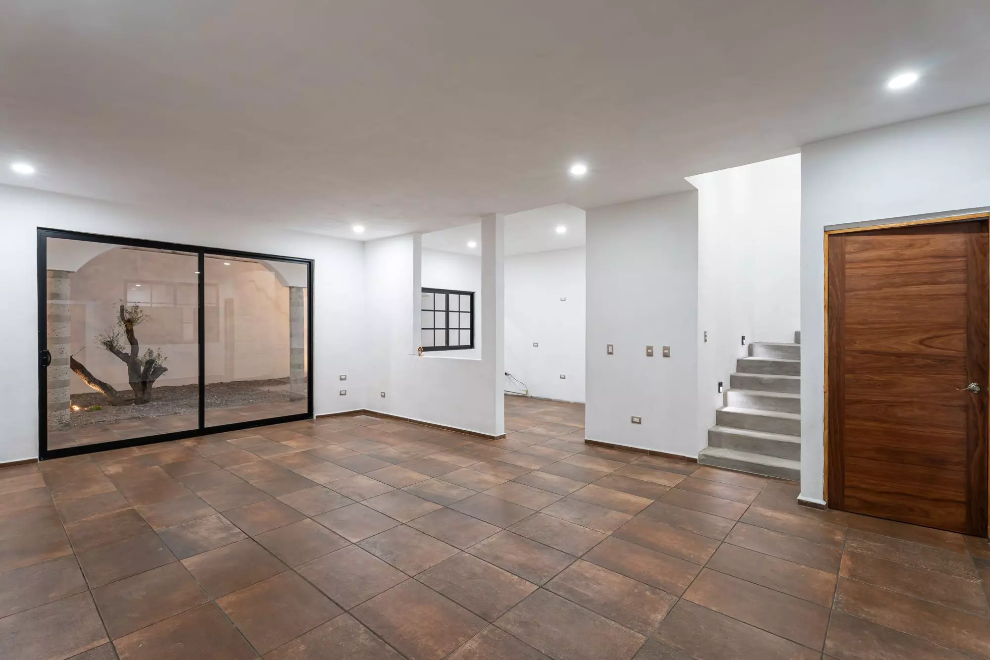 Casa Albor — La Palmita, San Miguel de Allende — photo 18 — spacious modern living with courtyard views
