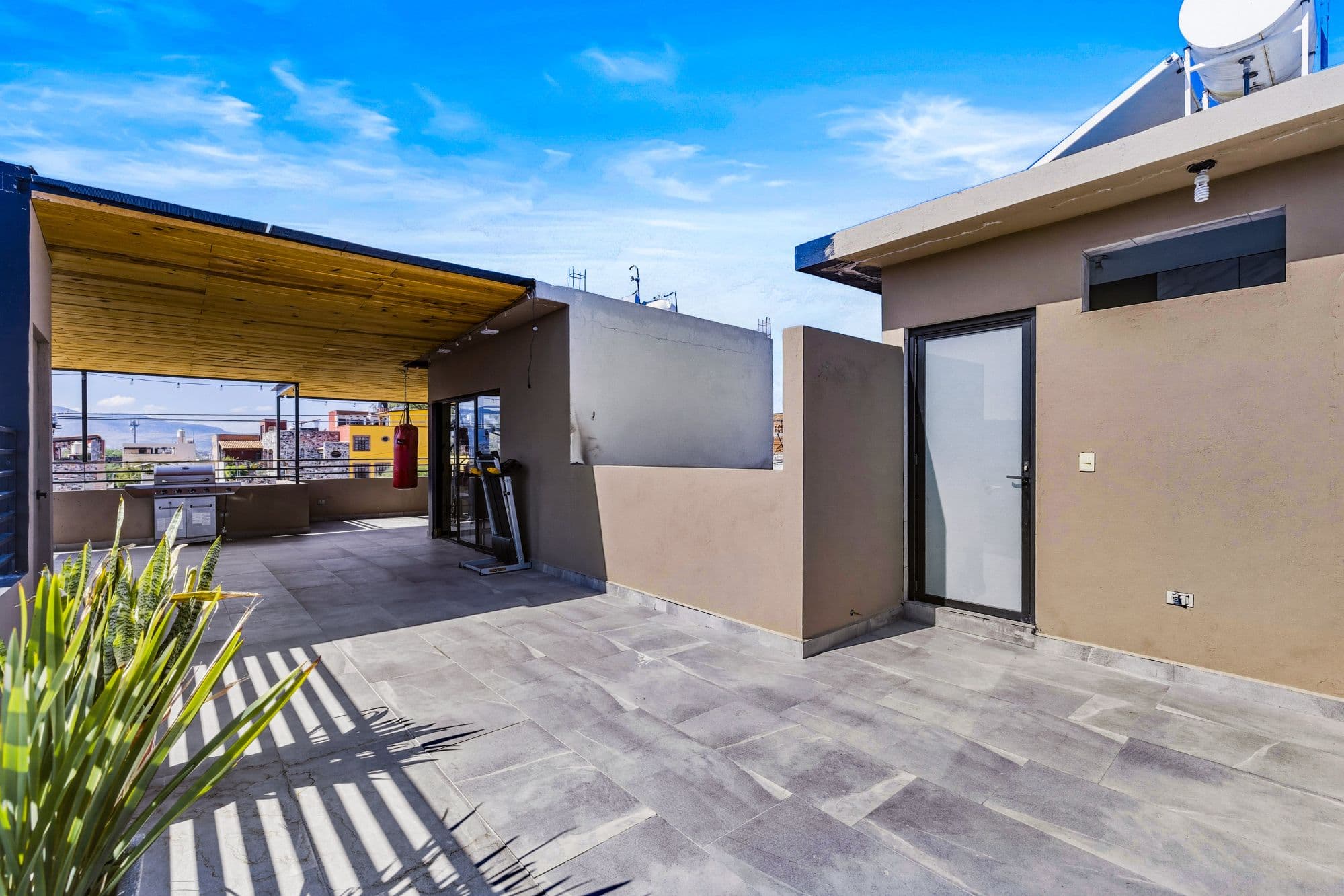 Casa Dalias — Lindavista, San Miguel de Allende — photo 24 — panoramic rooftop terrace, modern sophistication