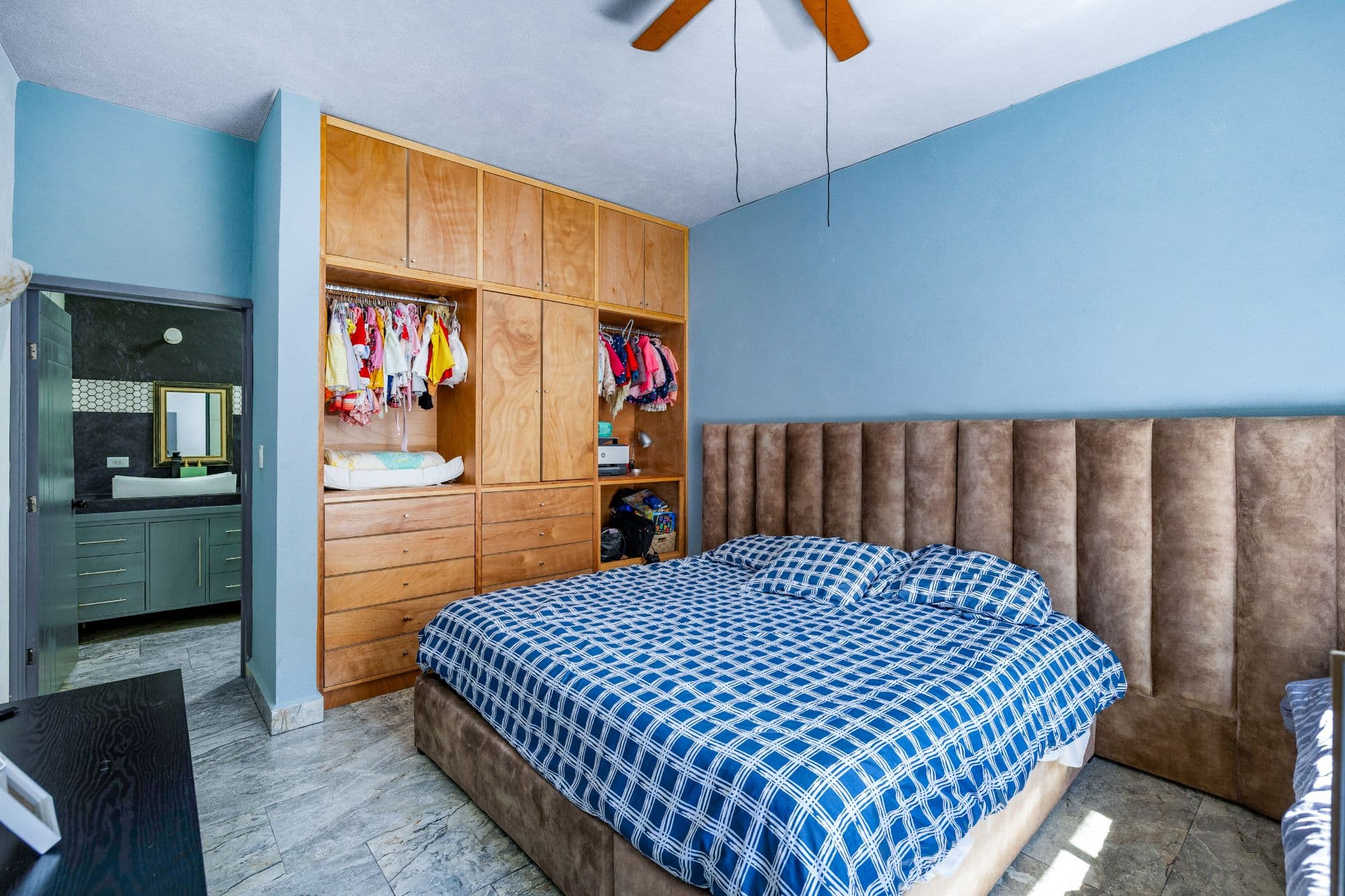 Casa Dalias — Lindavista, San Miguel de Allende — photo 10 — spacious master suite with custom cabinetry