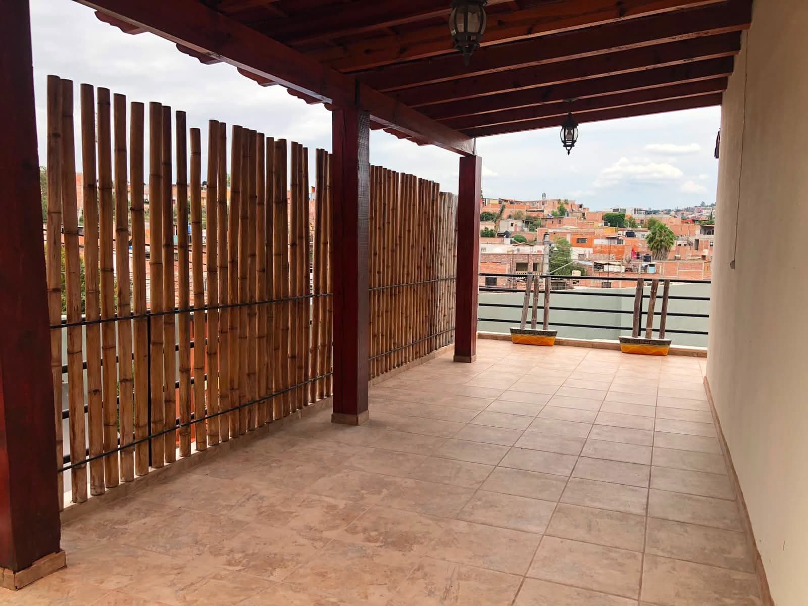 Casa Vista Carolina — Lindavista, San Miguel de Allende — photo 10 — expansive terrace with panoramic city views