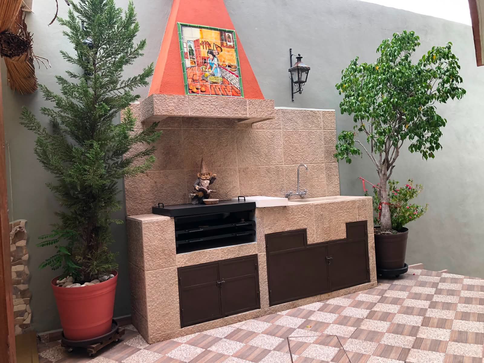 Casa Vista Carolina — Lindavista, San Miguel de Allende — photo 19 — charming courtyard kitchen with rustic character