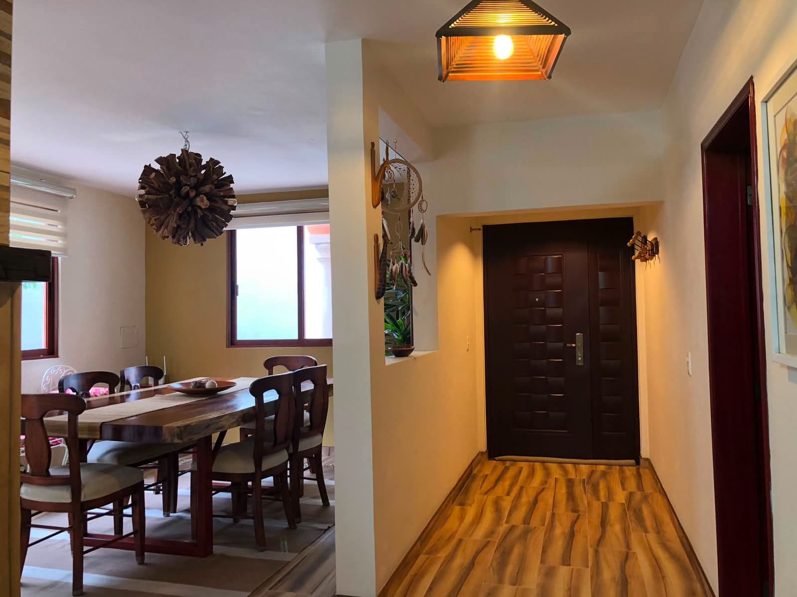 Casa Vista Carolina — Lindavista, San Miguel de Allende — photo 18 — warm hallway, elegant dining connection