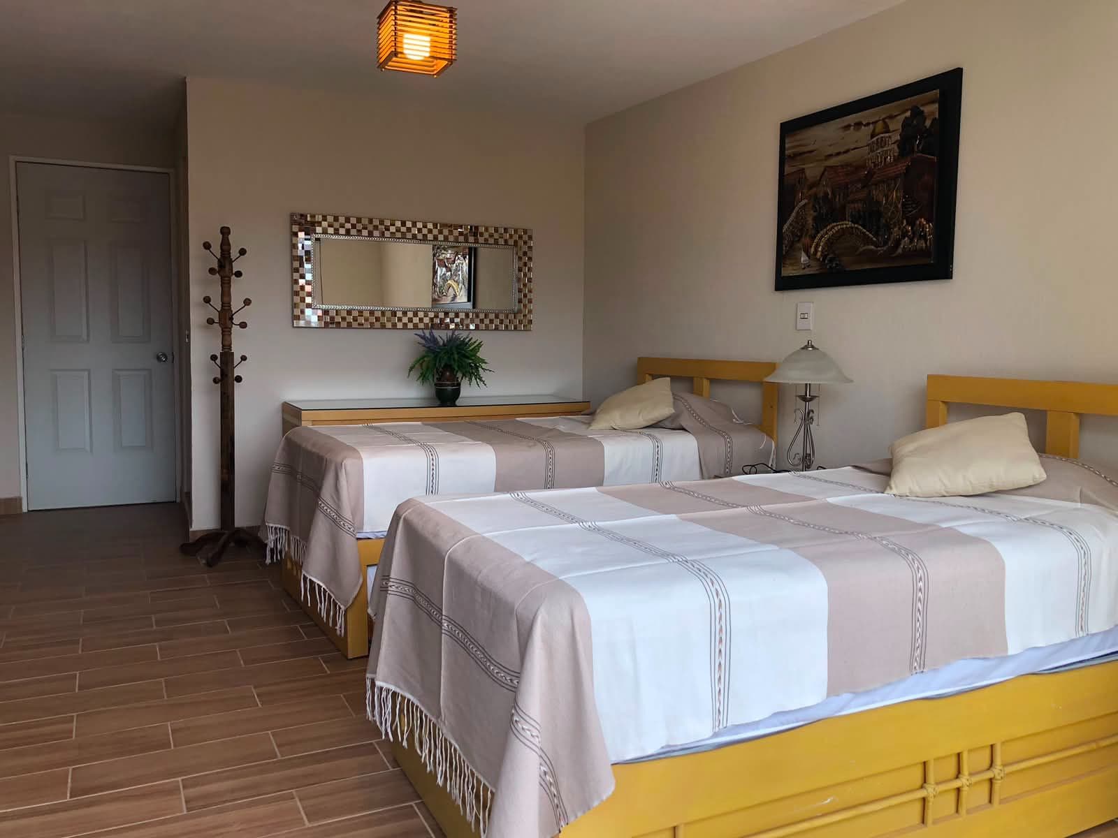 Casa Vista Carolina — Lindavista, San Miguel de Allende — photo 4 — charming colonial guest bedroom, authentic warmth