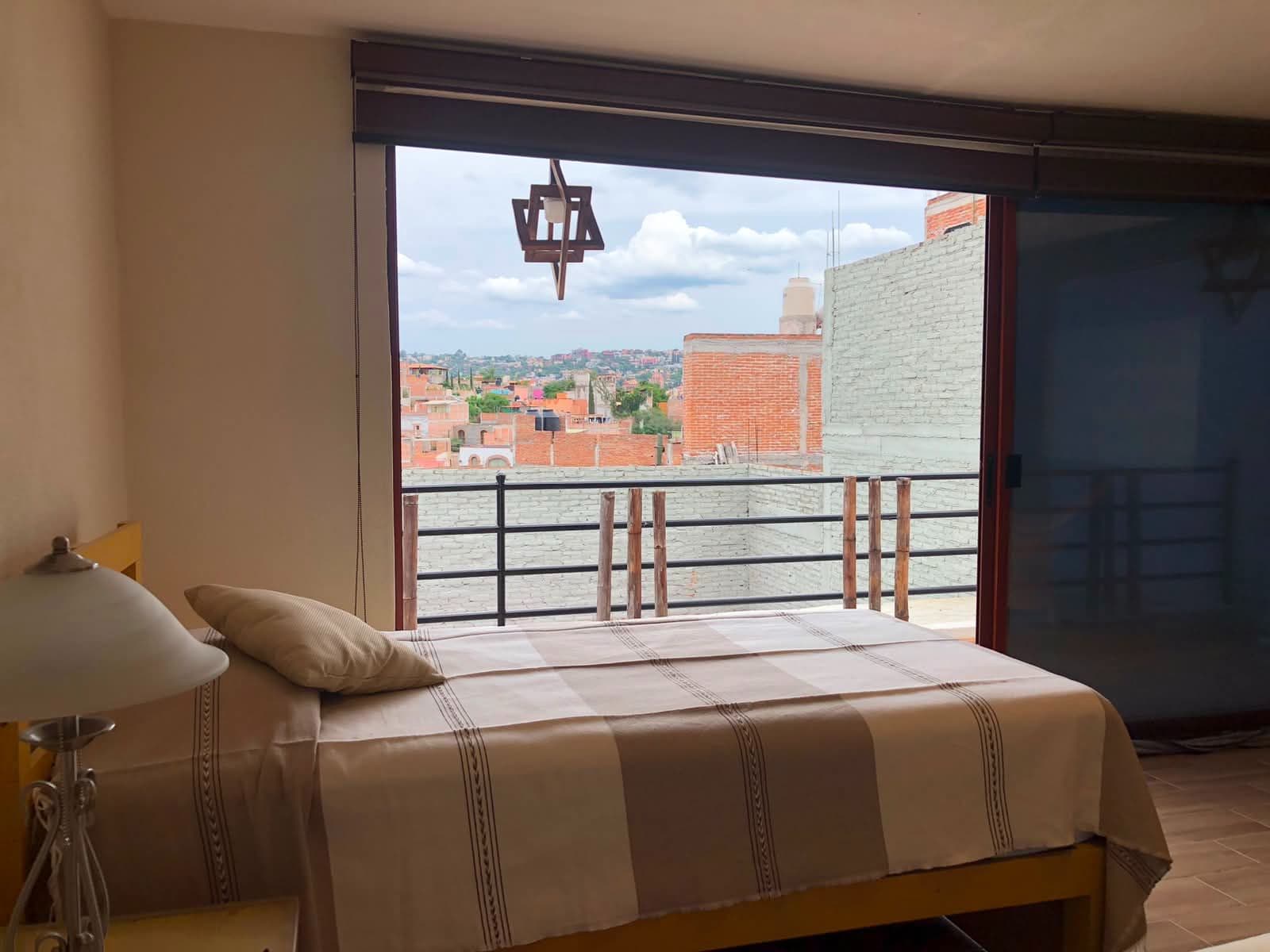 Casa Vista Carolina — Lindavista, San Miguel de Allende — photo 6 — panoramic mountain views, luminous bedroom sanctuary