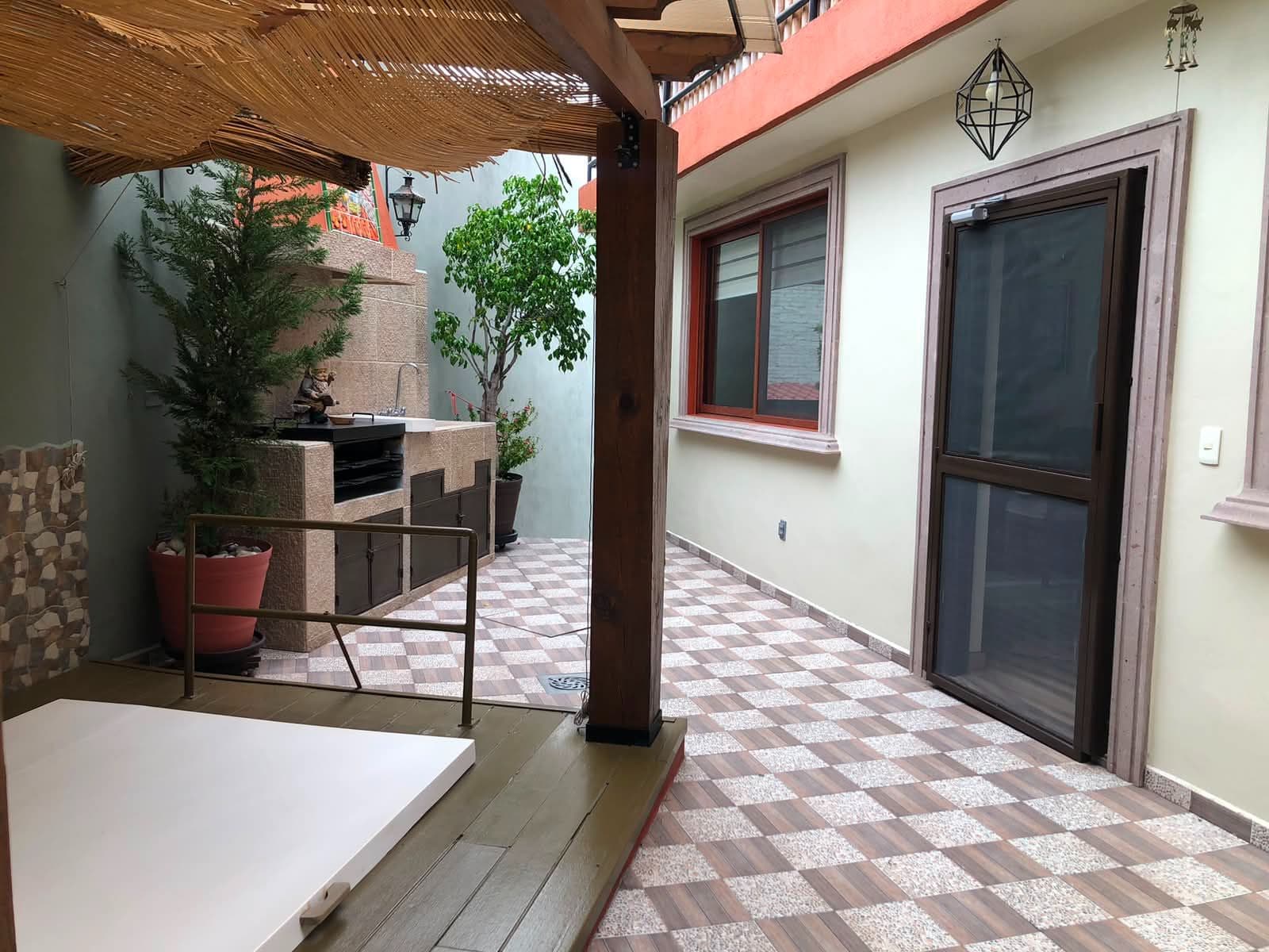 Casa Vista Carolina — Lindavista, San Miguel de Allende — photo 20 — charming courtyard with rustic outdoor kitchen