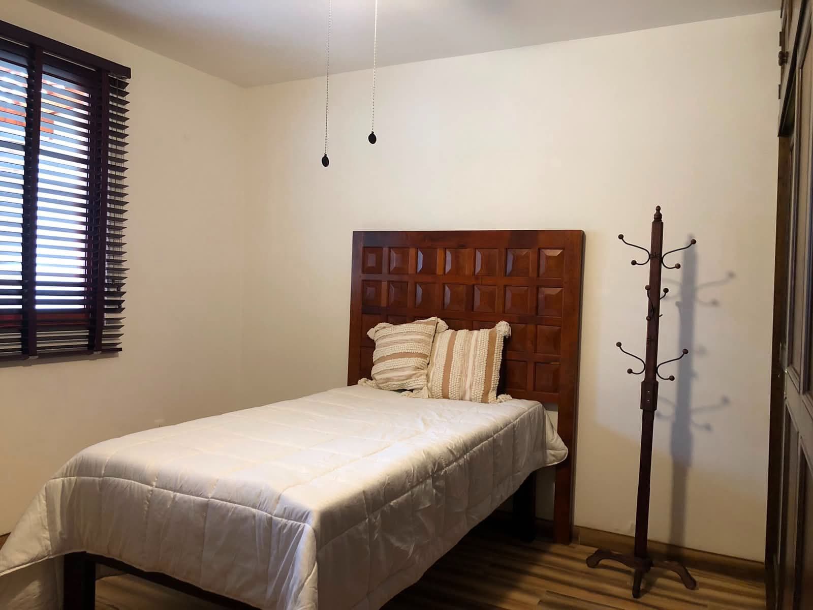 Casa Vista Carolina — Lindavista, San Miguel de Allende — photo 13 — serene bedroom, rustic elegance, natural light