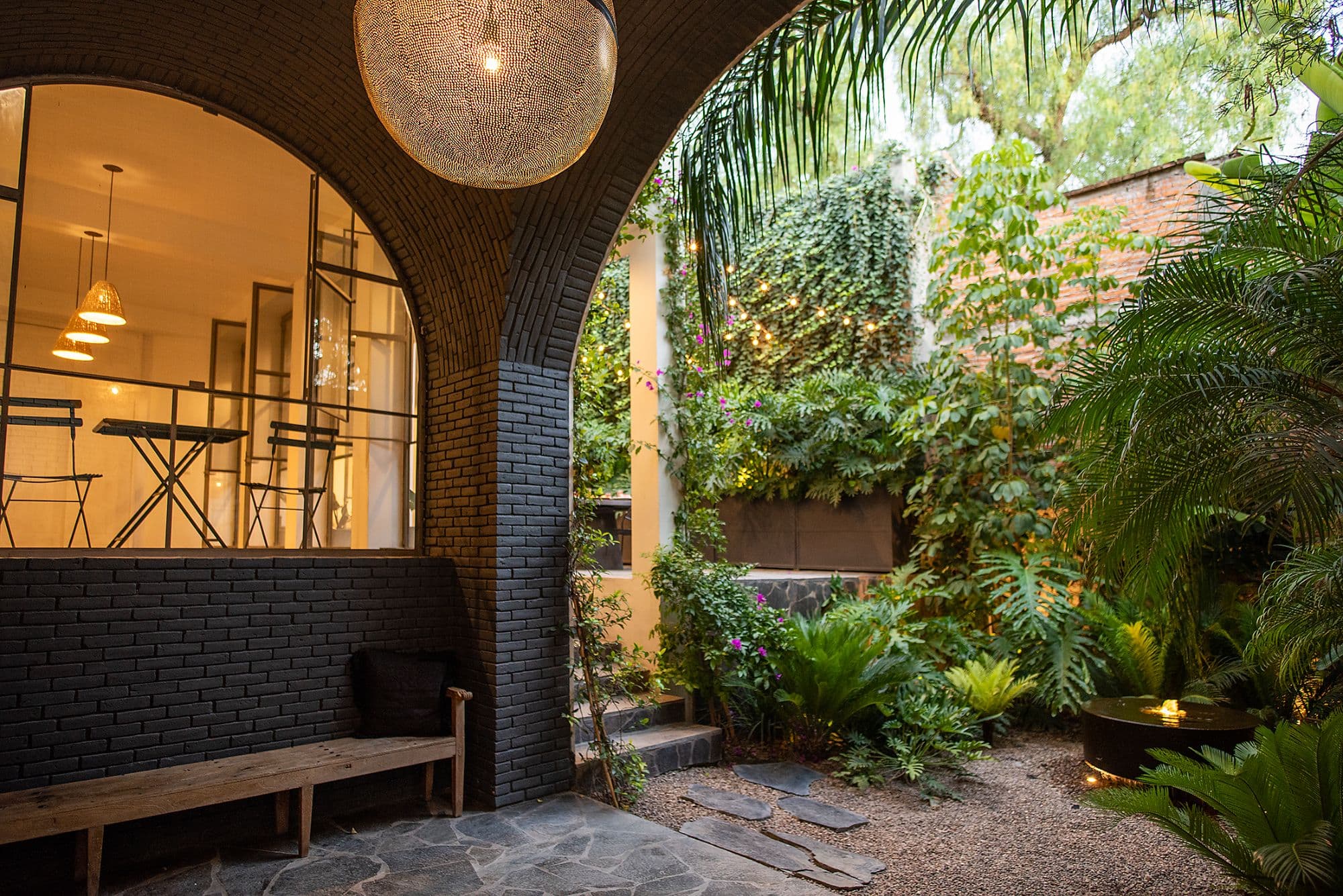 CASA CLARA — Centro, San Miguel de Allende — photo 27 — intimate courtyard with verdant botanicals