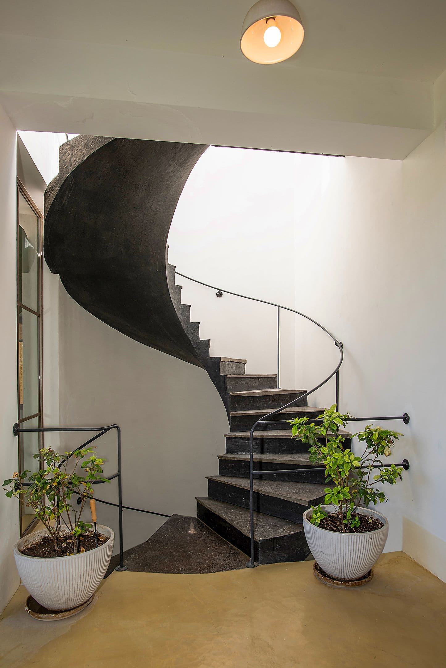 CASA CLARA — Centro, San Miguel de Allende — photo 9 — sculptural spiral staircase, contemporary elegance