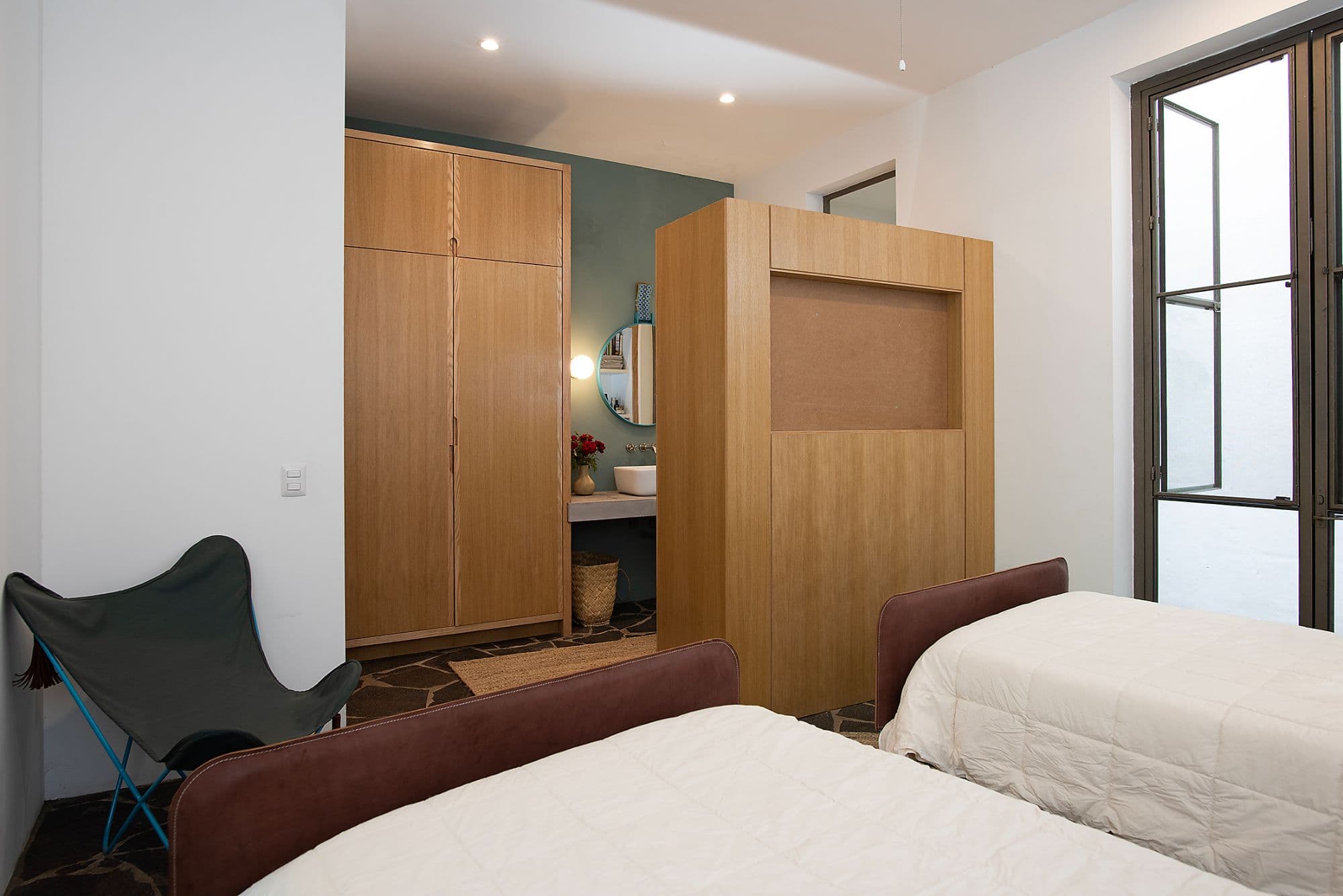 CASA CLARA — Centro, San Miguel de Allende — photo 14 — contemporary bedroom, warm wood elegance