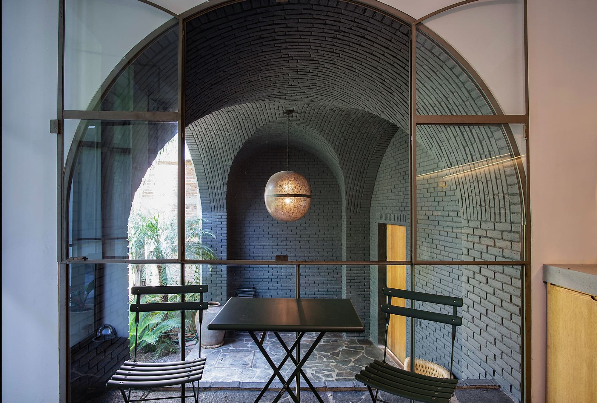 CASA CLARA — Centro, San Miguel de Allende — photo 5 — sophisticated vaulted brick courtyard