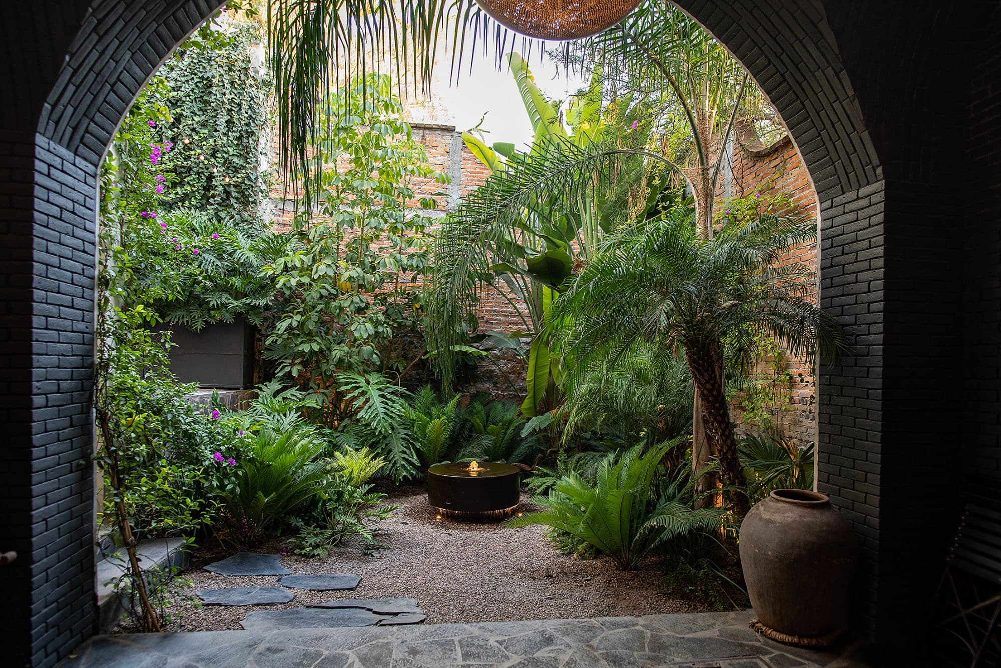 CASA CLARA — Centro, San Miguel de Allende — photo 21 — lush tropical courtyard oasis