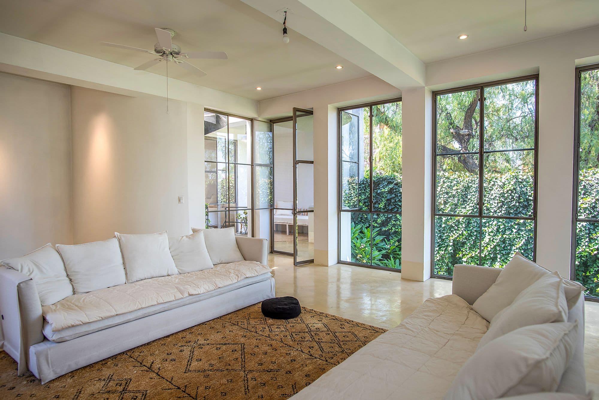CASA CLARA — Centro, San Miguel de Allende — photo 8 — luminous living space, garden views
