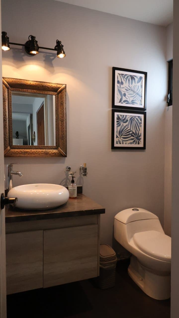 Propiedad en Venta en Zirándaro | San Miguel de Allende — Zirándaro, San Miguel de Allende — photo 12 — elegant powder room, warm ambient lighting