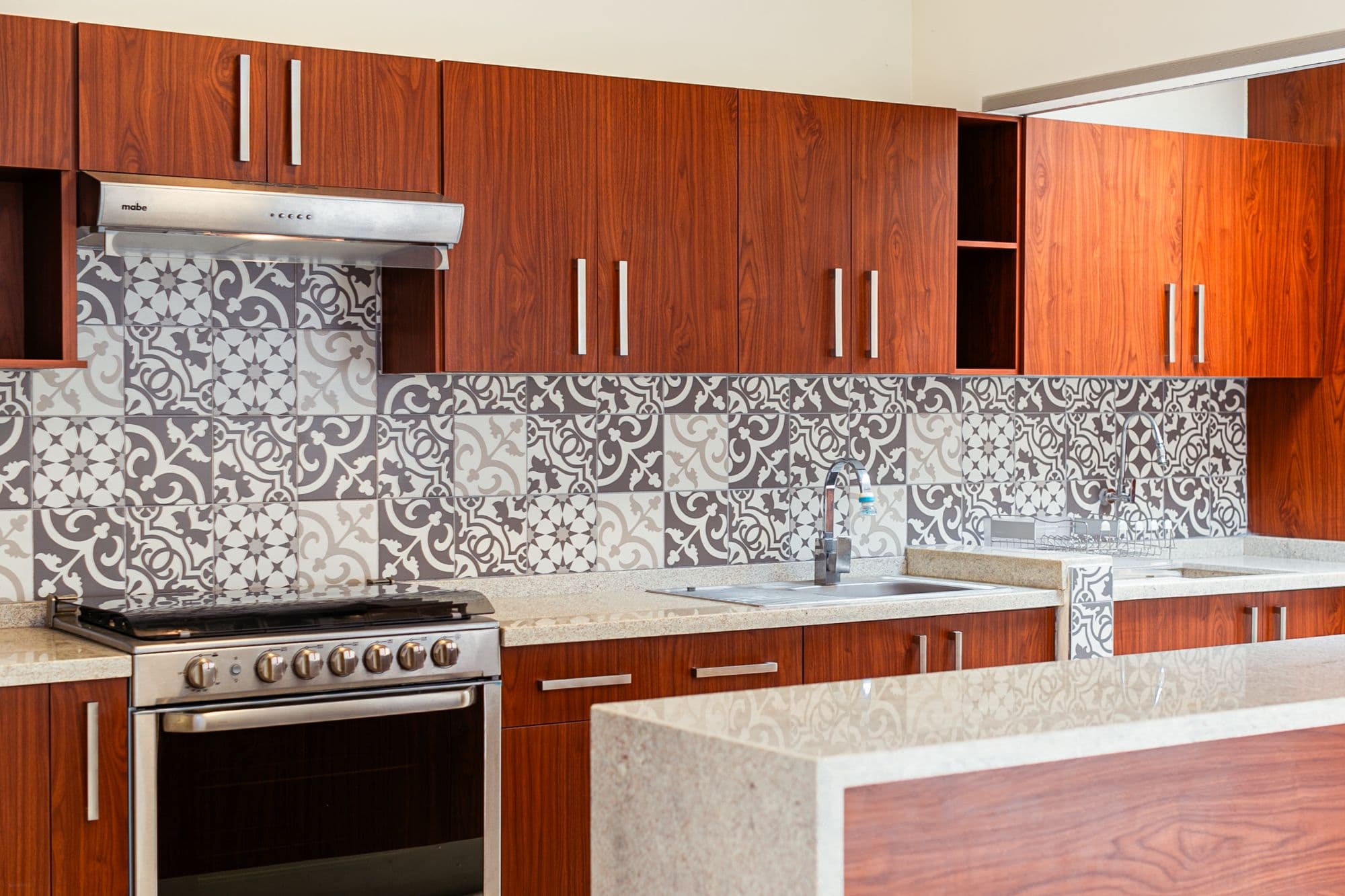 Casa Circuito El Reloj — Zirándaro, San Miguel de Allende — photo 6 — contemporary kitchen with artisan tile accents