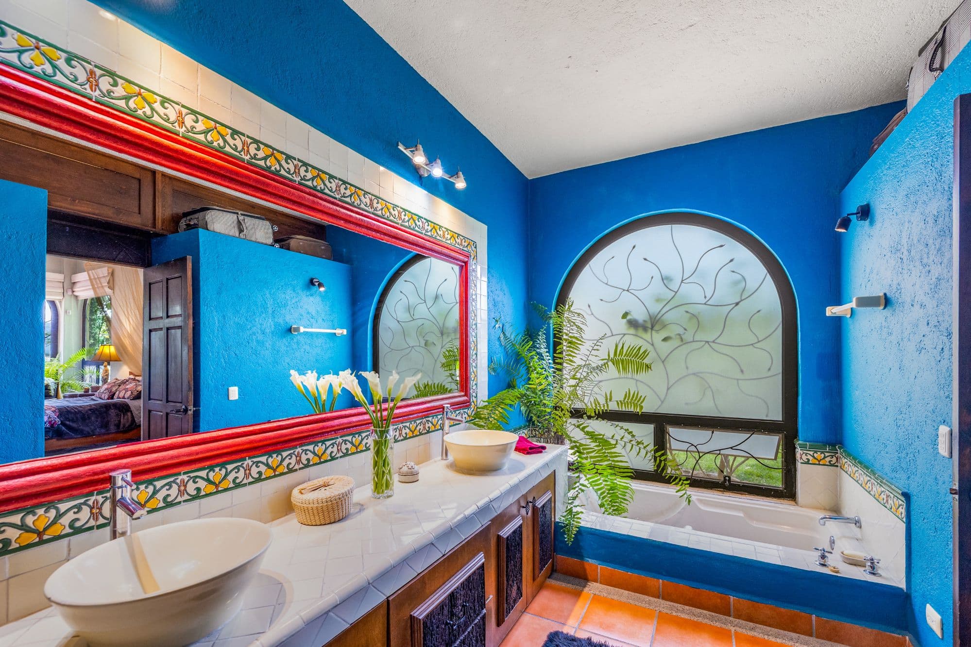 Casa Jardin Secreto — Los Labradores, San Miguel de Allende — photo 12 — vibrant colonial bathroom, artisan tile details