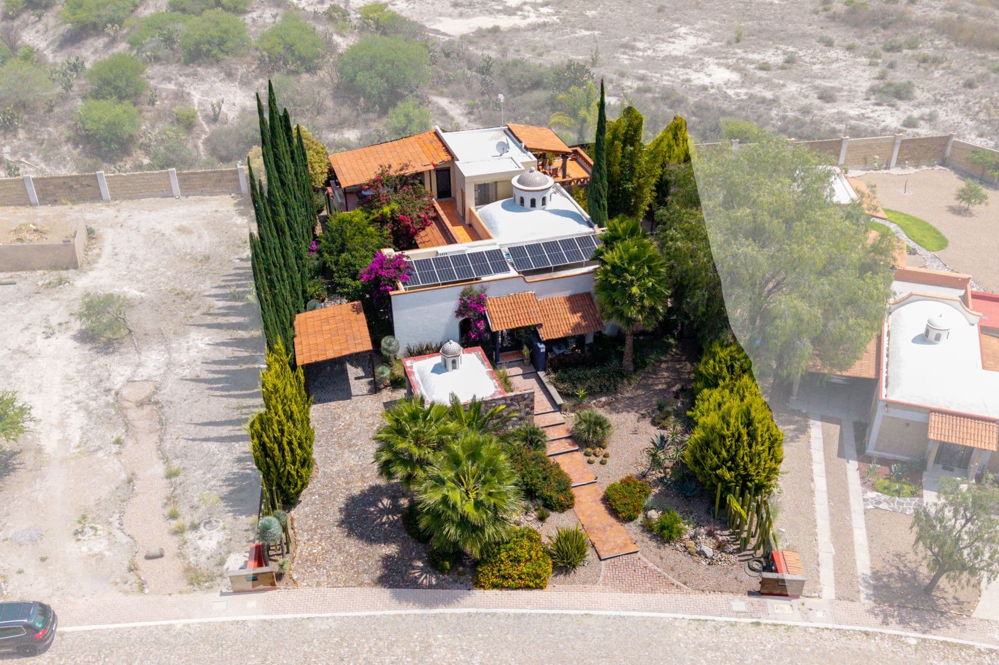 Casa Jardin Secreto — Los Labradores, San Miguel de Allende — photo 21 — sunlit mexican hacienda with terraced gardens