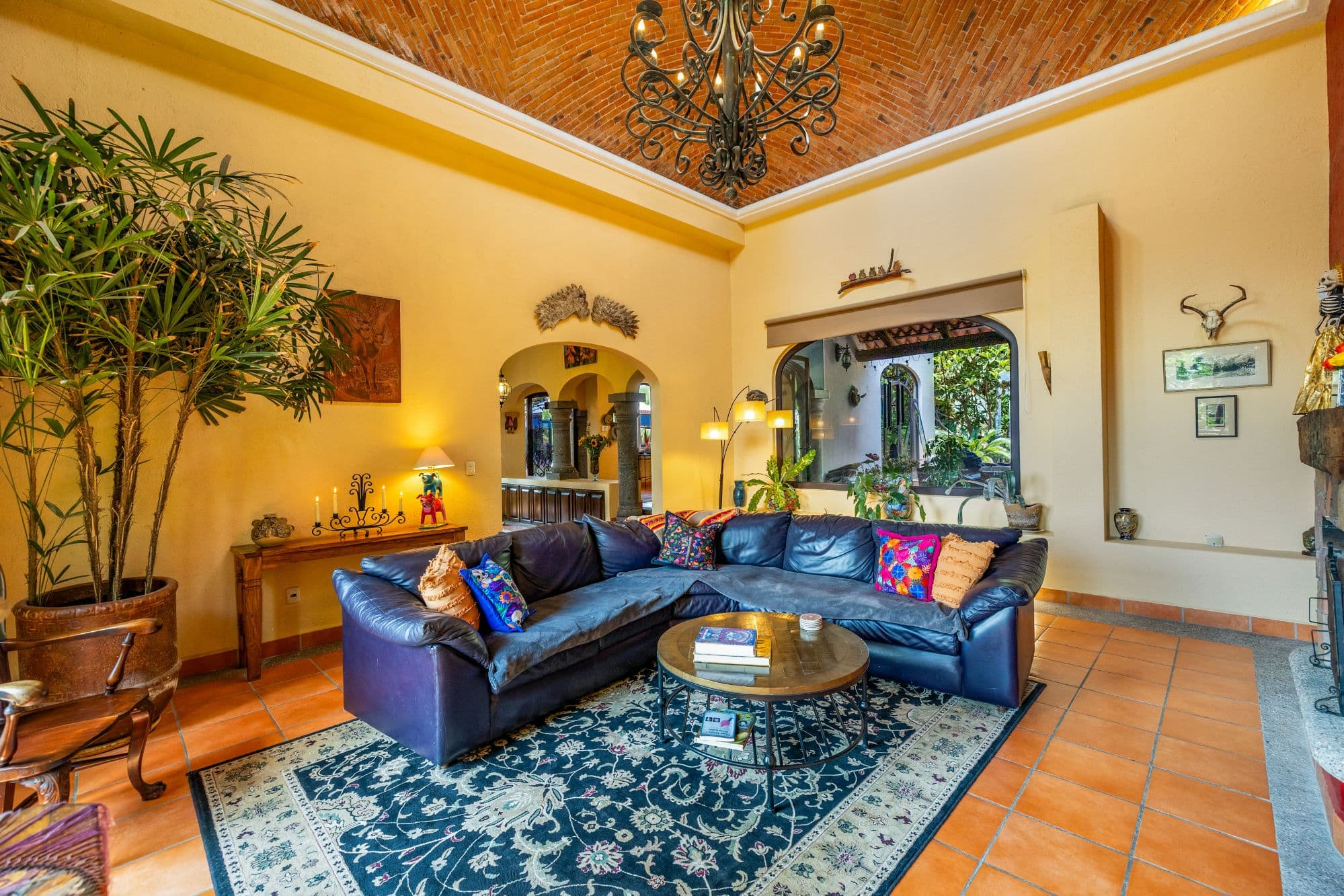 Casa Jardin Secreto — Los Labradores, San Miguel de Allende — photo 7 — sunlit colonial living room, artfully appointed