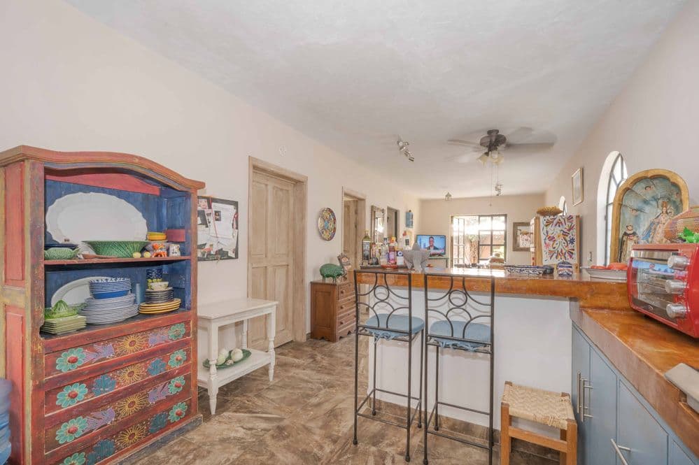 Duplex Fray Bartolome — Independencia, San Miguel de Allende — photo 17 — vibrant traditional mexican kitchen elegance