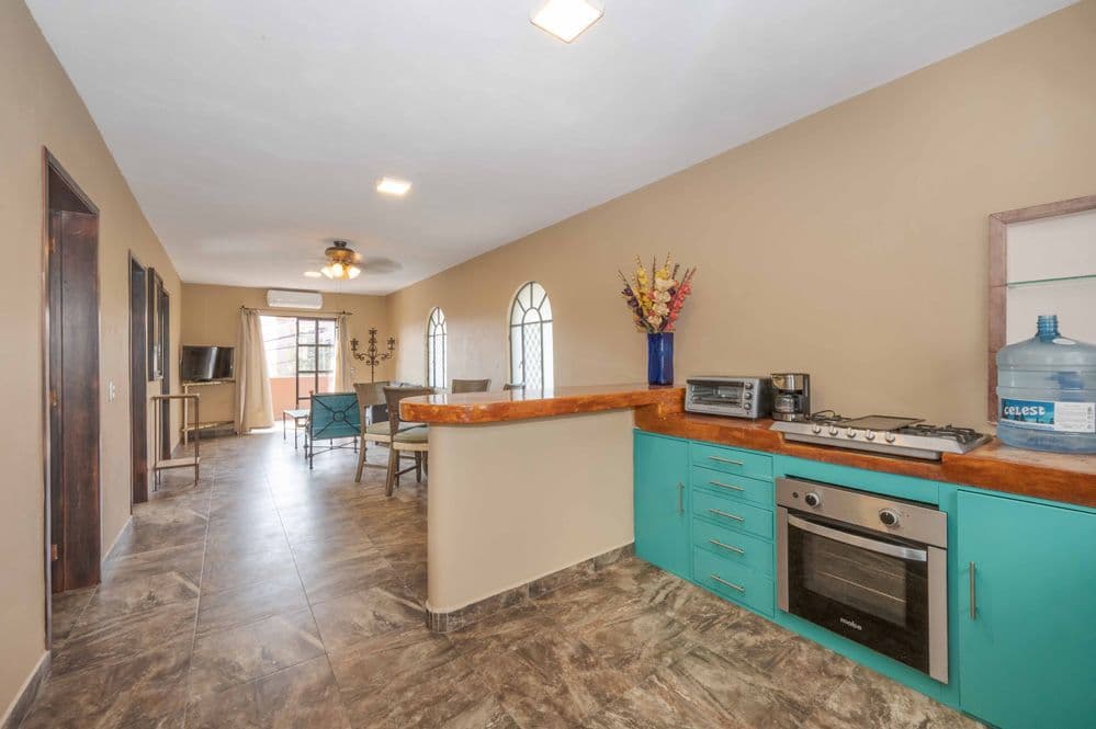 Duplex Fray Bartolome — Independencia, San Miguel de Allende — photo 3 — bright, modern kitchen with turquoise accents
