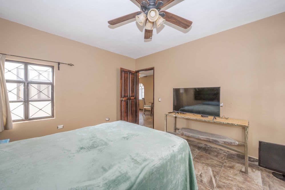 Duplex Fray Bartolome — Independencia, San Miguel de Allende — photo 11 — serene primary suite, abundant natural light