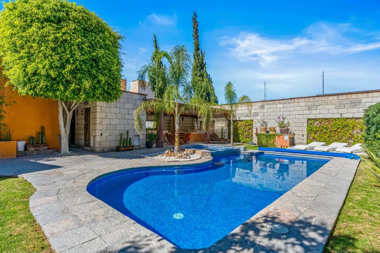Casa Romana — Centro, San Miguel de Allende — photo 25 — stunning pool, lush tropical oasis