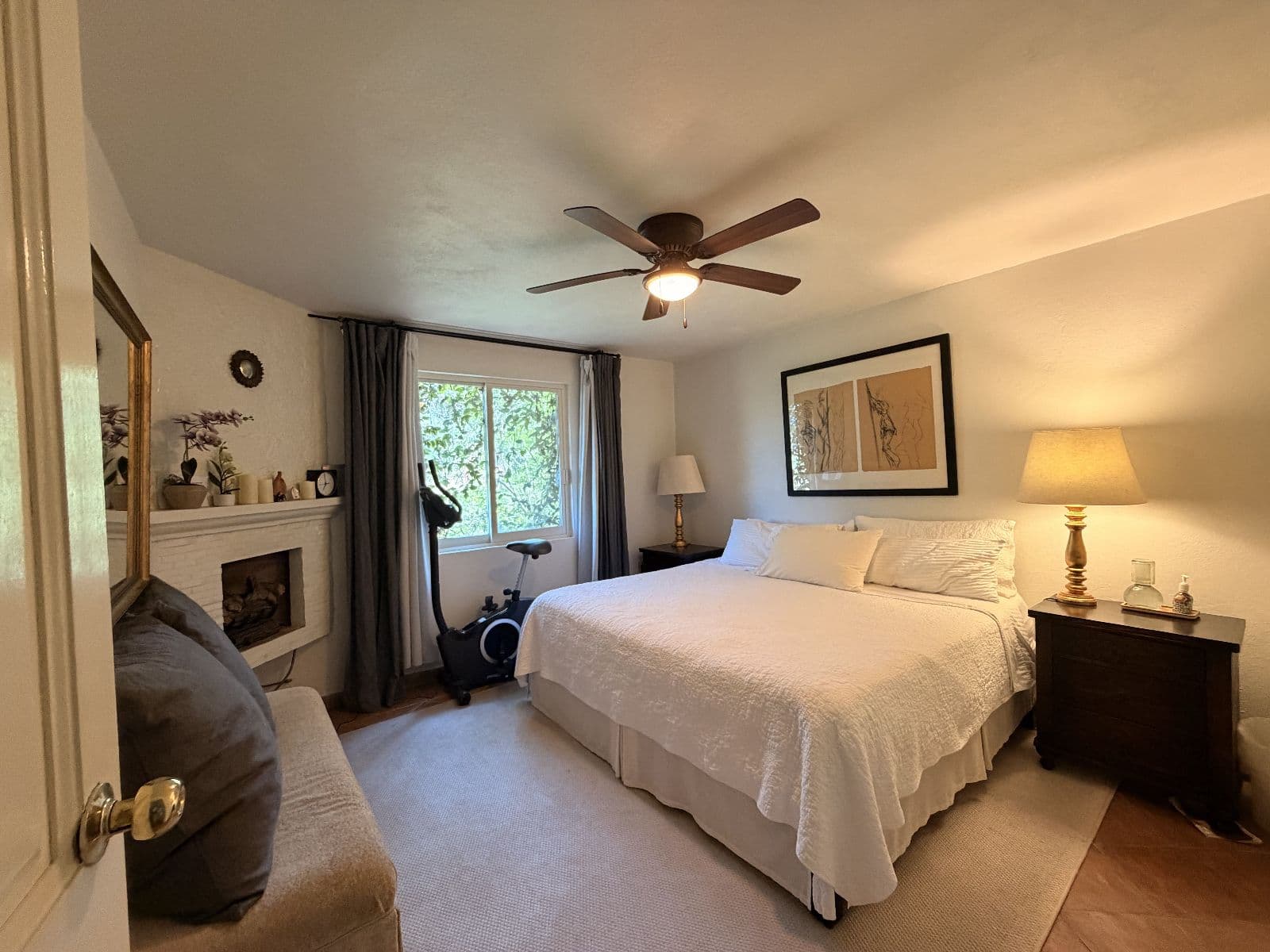 Molly Mellor — Centro, San Miguel de Allende — photo 6 — serene primary suite, fireplace warmth