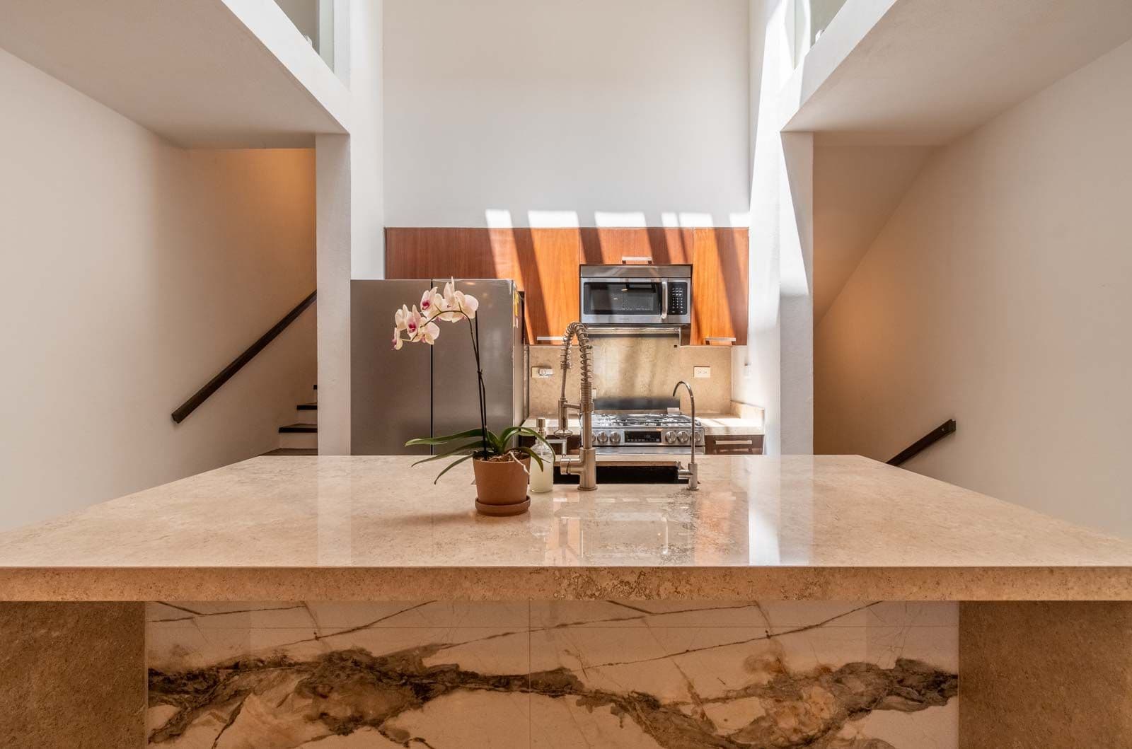 Casa Blanca — Centro, San Miguel de Allende — photo 10 — luminous contemporary kitchen with dramatic skylights
