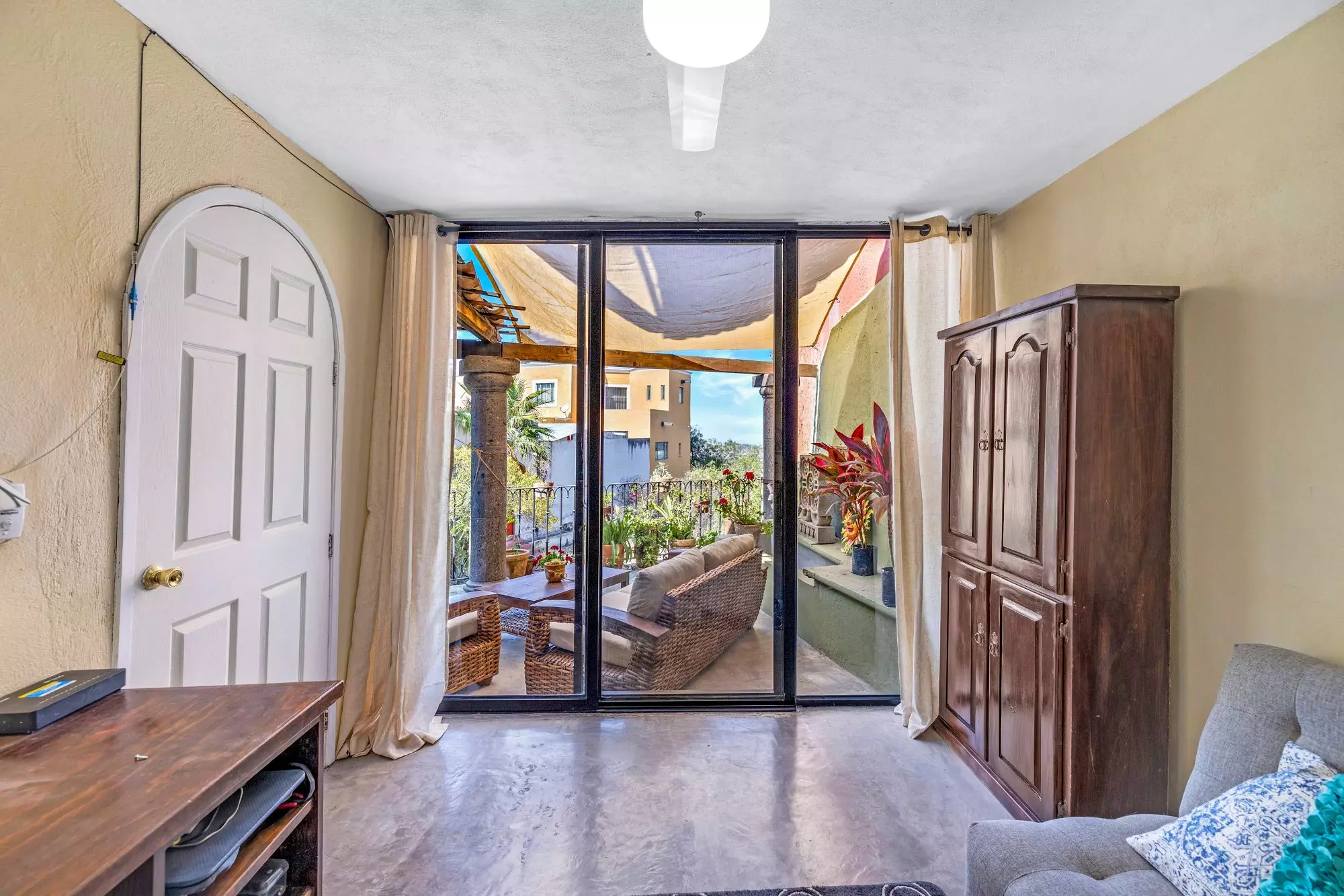 Casa Montitlan — Balcones, San Miguel de Allende — photo 19 — luminous bedroom, expansive terrace views