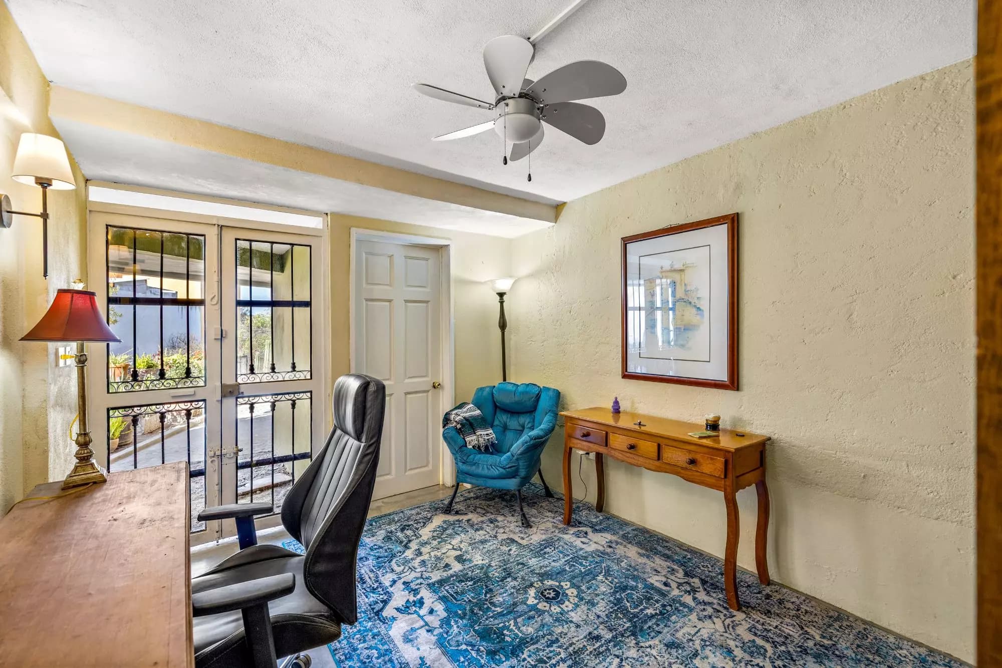 Casa Montitlan — Balcones, San Miguel de Allende — photo 7 — luminous home office with serene garden views