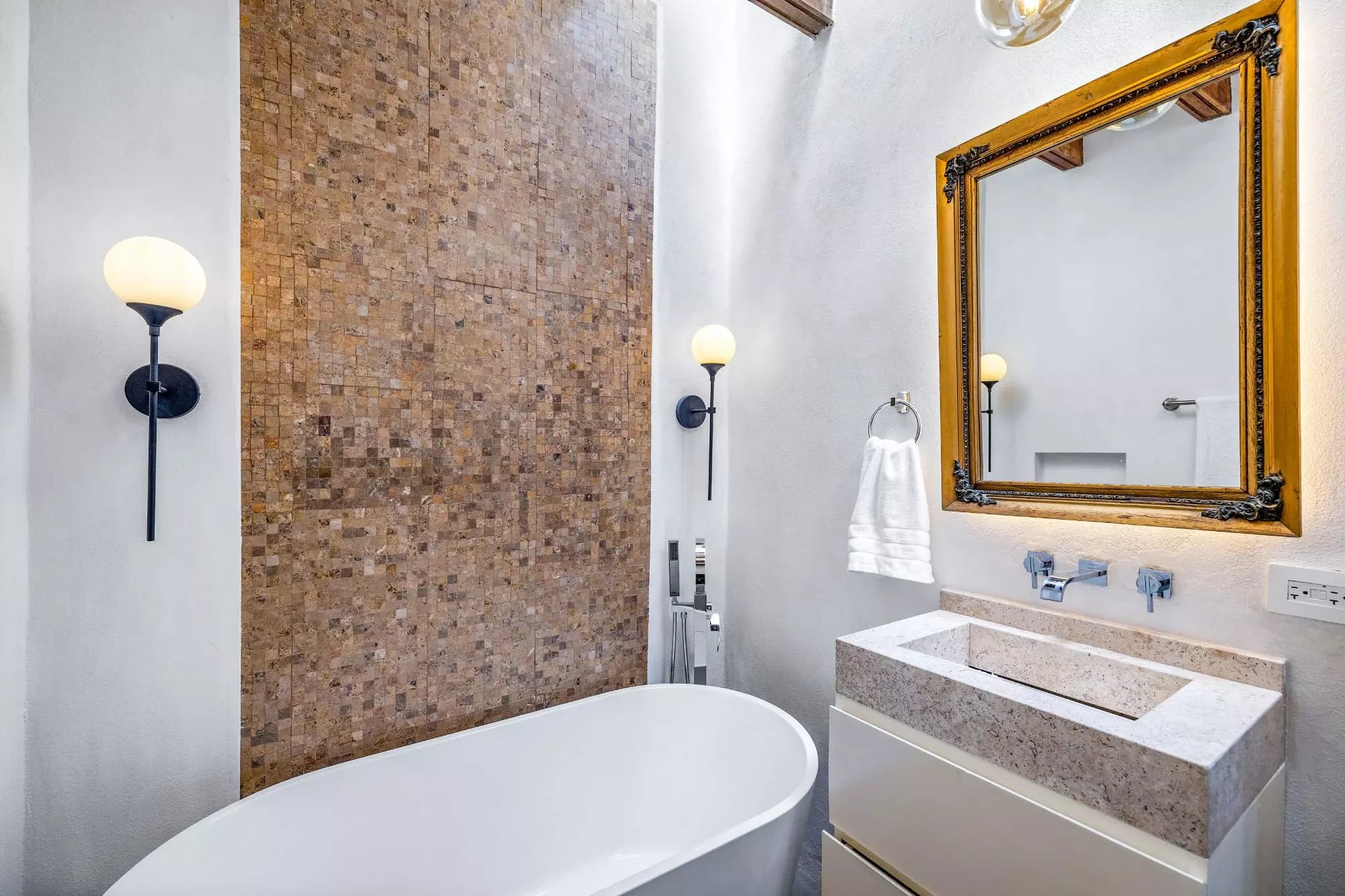 Casa Montitlan — Balcones, San Miguel de Allende — photo 12 — spa-inspired bathroom with artisanal finishes