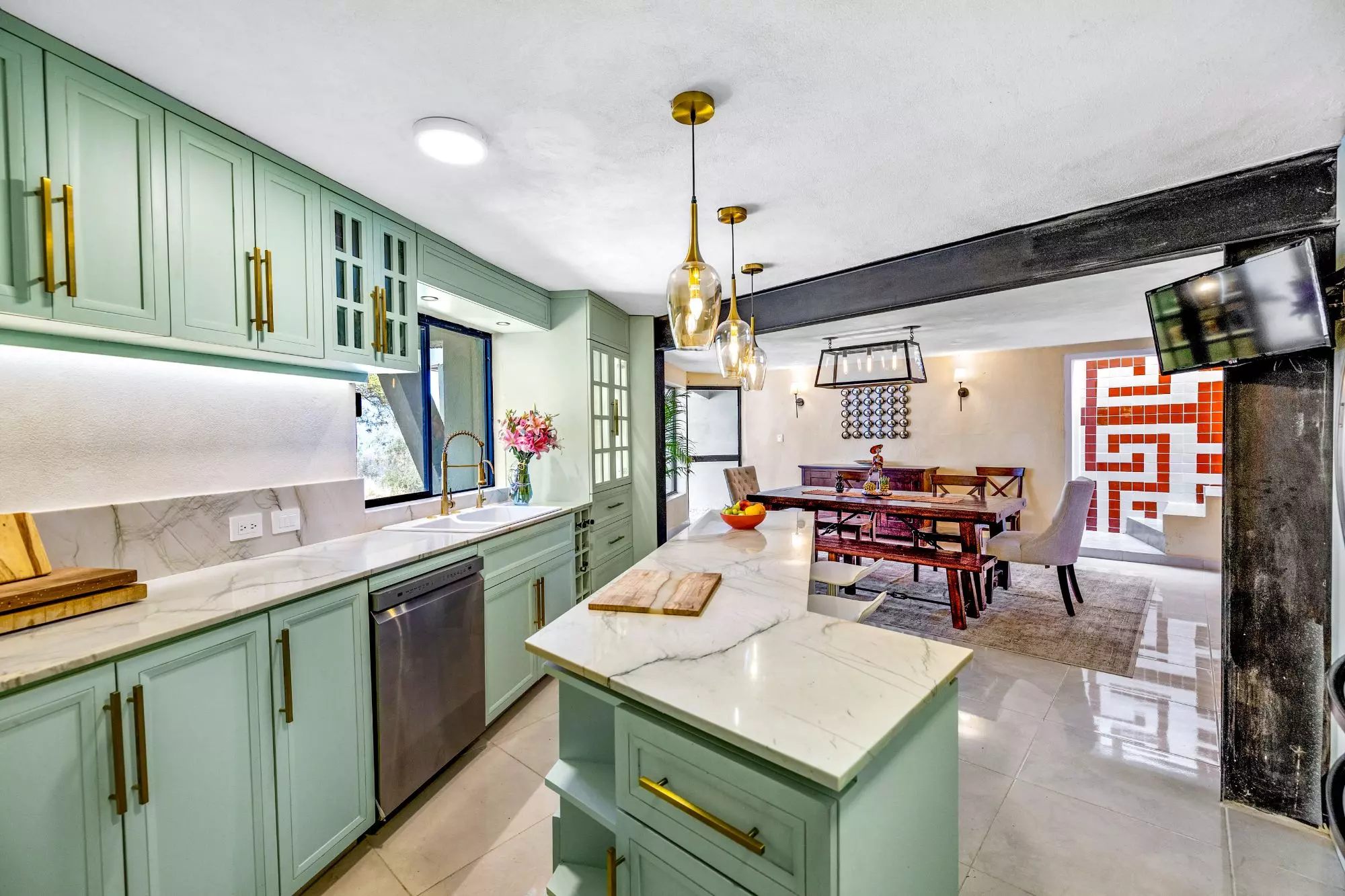 Casa Montitlan — Balcones, San Miguel de Allende — photo 6 — sophisticated sage kitchen, gleaming marble finishes