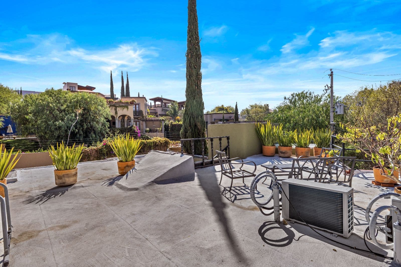 Casa Montitlan — Balcones, San Miguel de Allende — photo 21 — expansive rooftop terrace with panoramic views