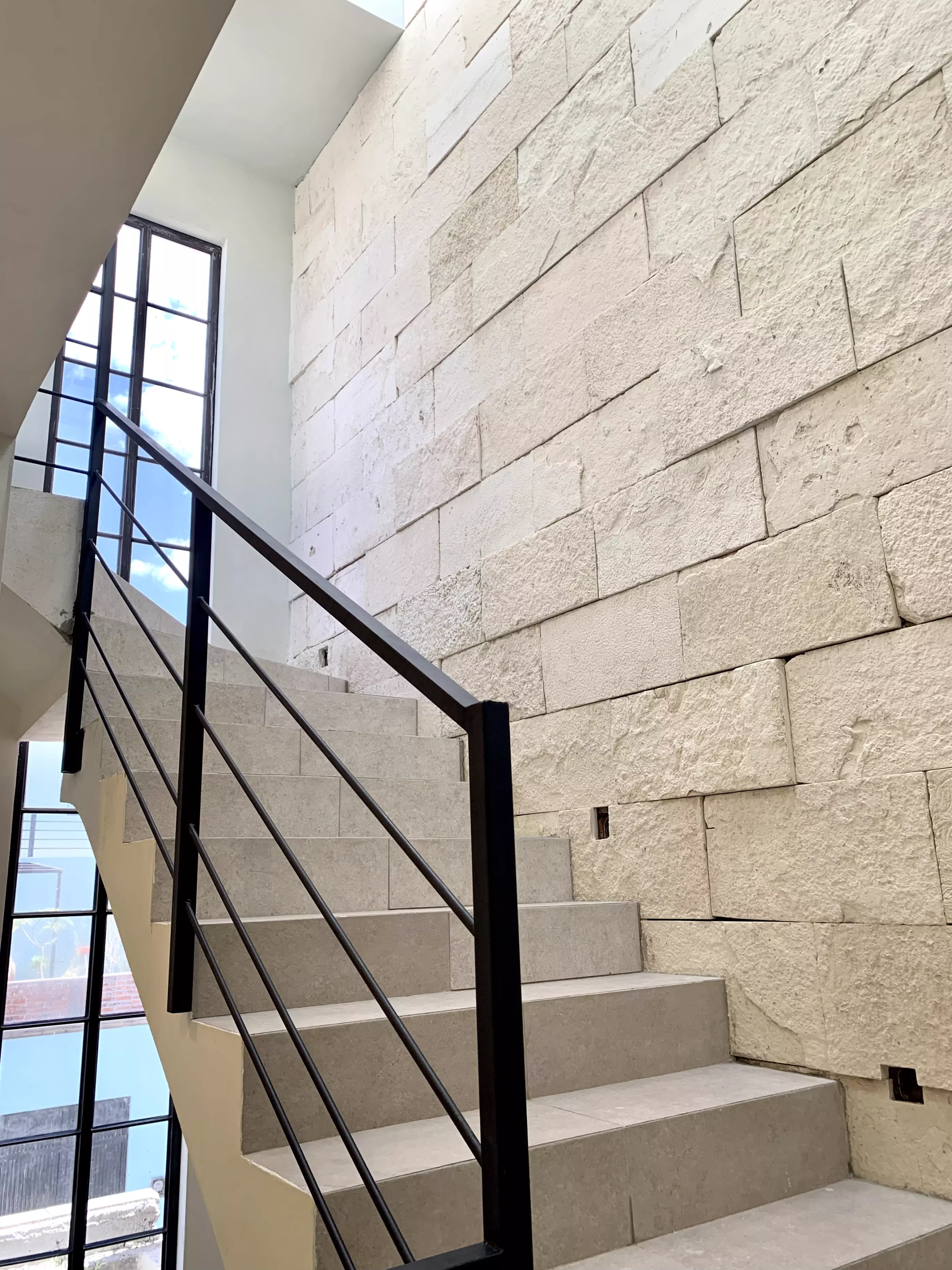 Casa San Carlos — San Rafael, San Miguel de Allende — photo 10 — modern staircase with architectural stone elegance
