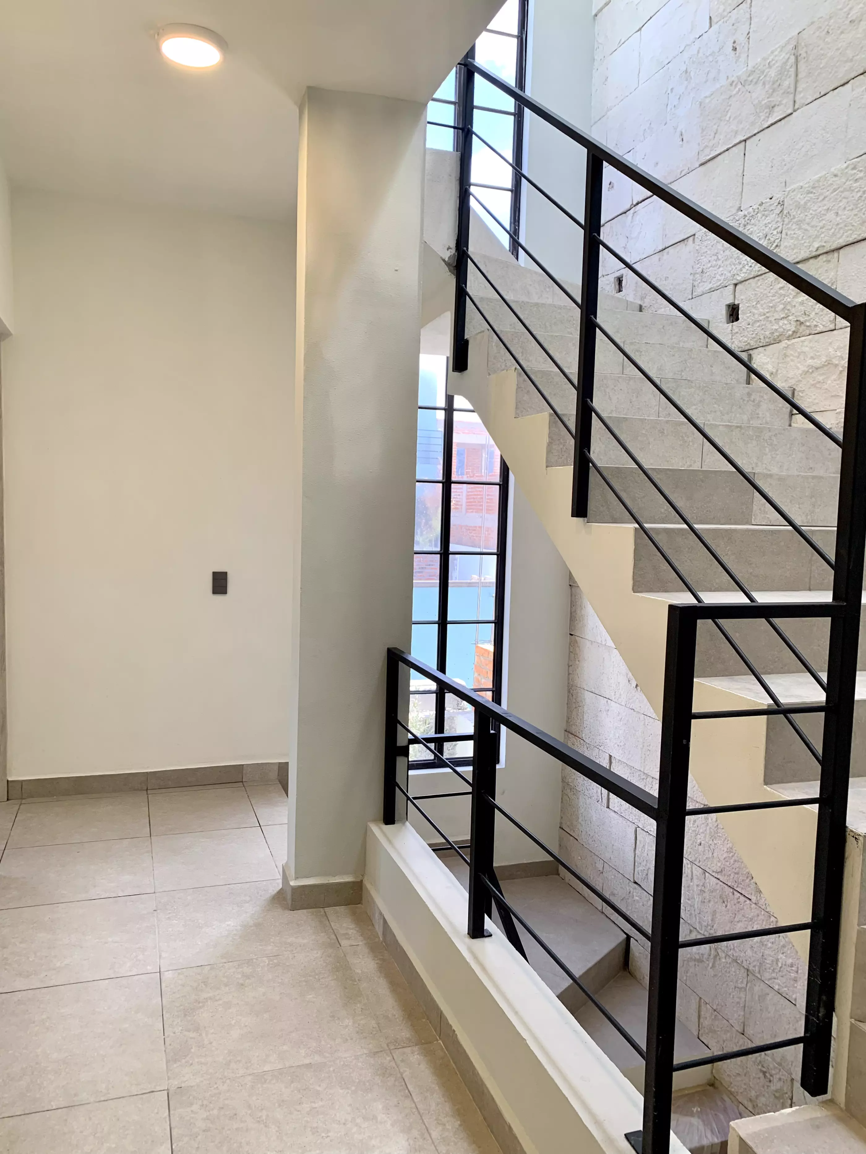 Casa San Carlos — San Rafael, San Miguel de Allende — photo 15 — modern stairwell with luminous natural light