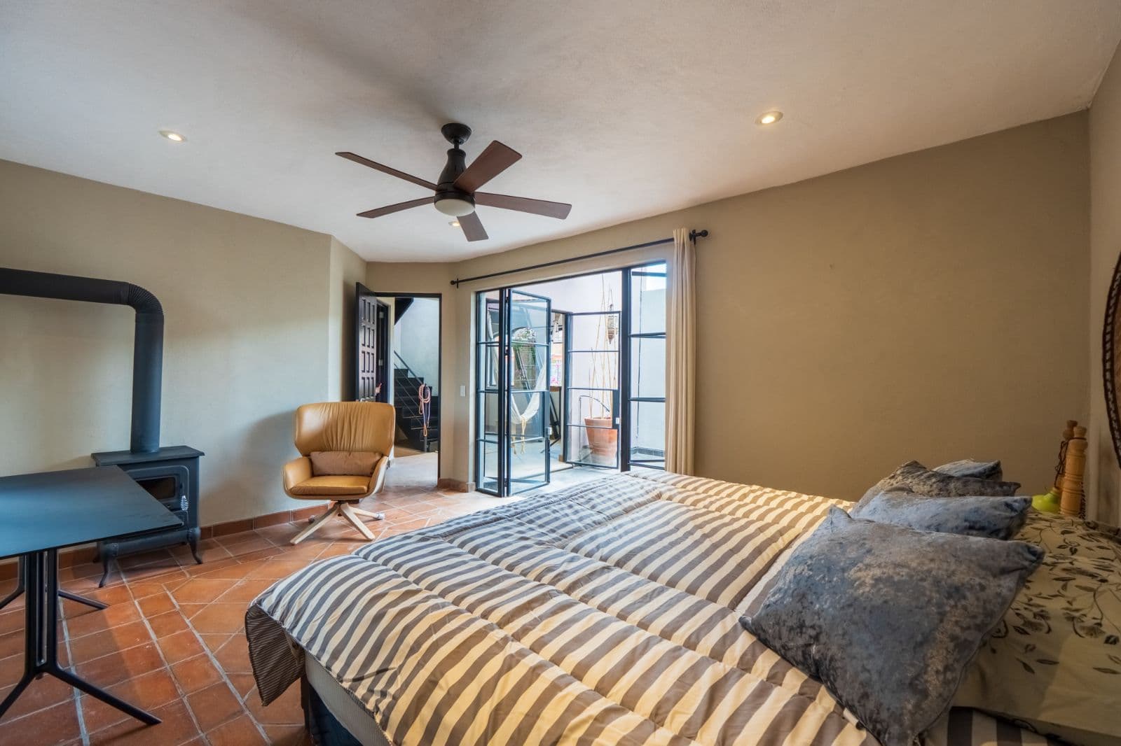 Casa Cielito Lindo — Guadalupe, San Miguel de Allende — photo 13 — sunlit master suite, private terrace views
