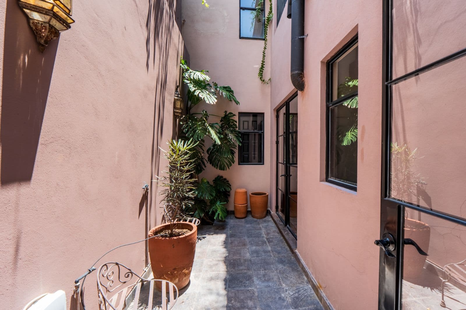 Casa Cielito Lindo — Guadalupe, San Miguel de Allende — photo 3 — charming courtyard, dappled sunlight, verdant oasis