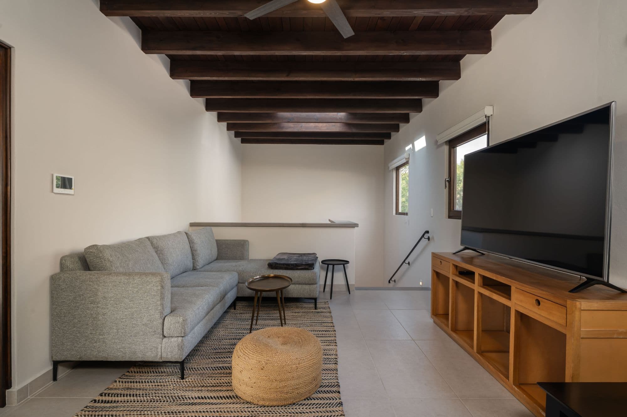 Casa Paulena — Balcones, San Miguel de Allende — photo 22 — contemporary living with exposed timber beams