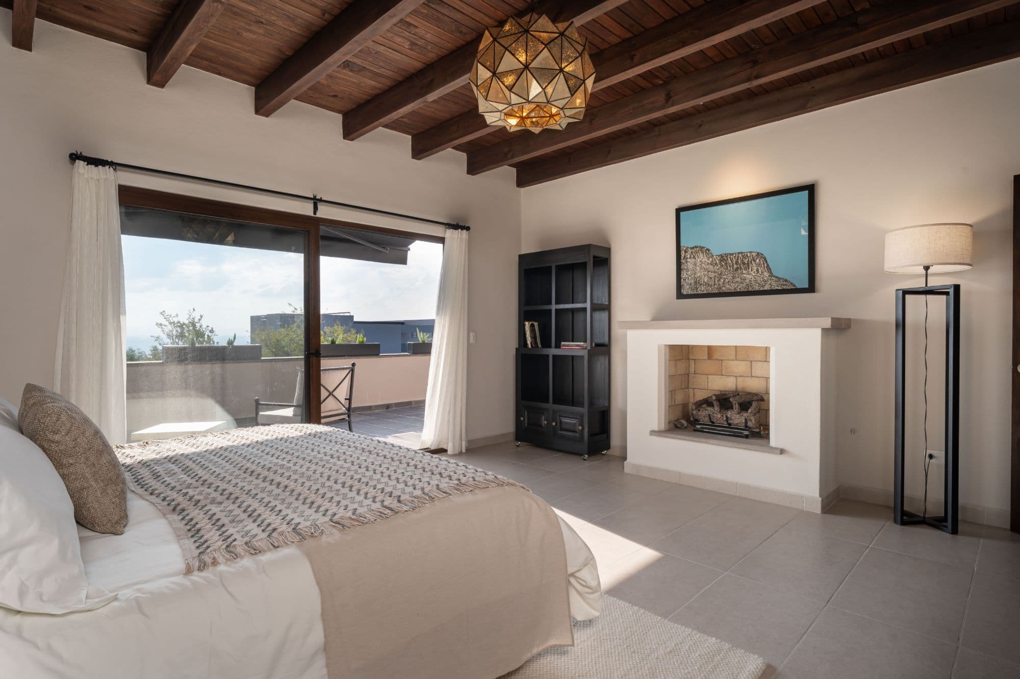 Casa Paulena — Balcones, San Miguel de Allende — photo 26 — luminous master suite, mountain views, fireplace