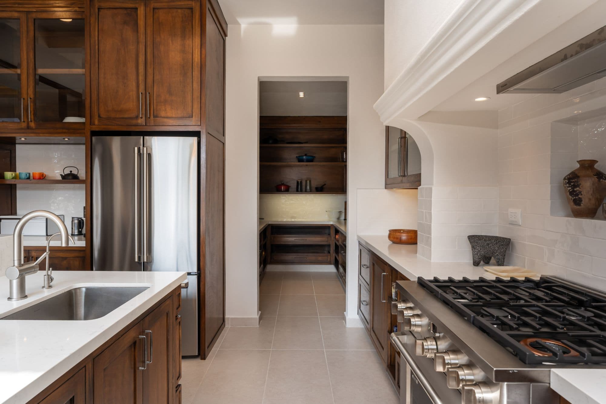Casa Paulena — Balcones, San Miguel de Allende — photo 10 — sophisticated chef's kitchen, elegant finishes