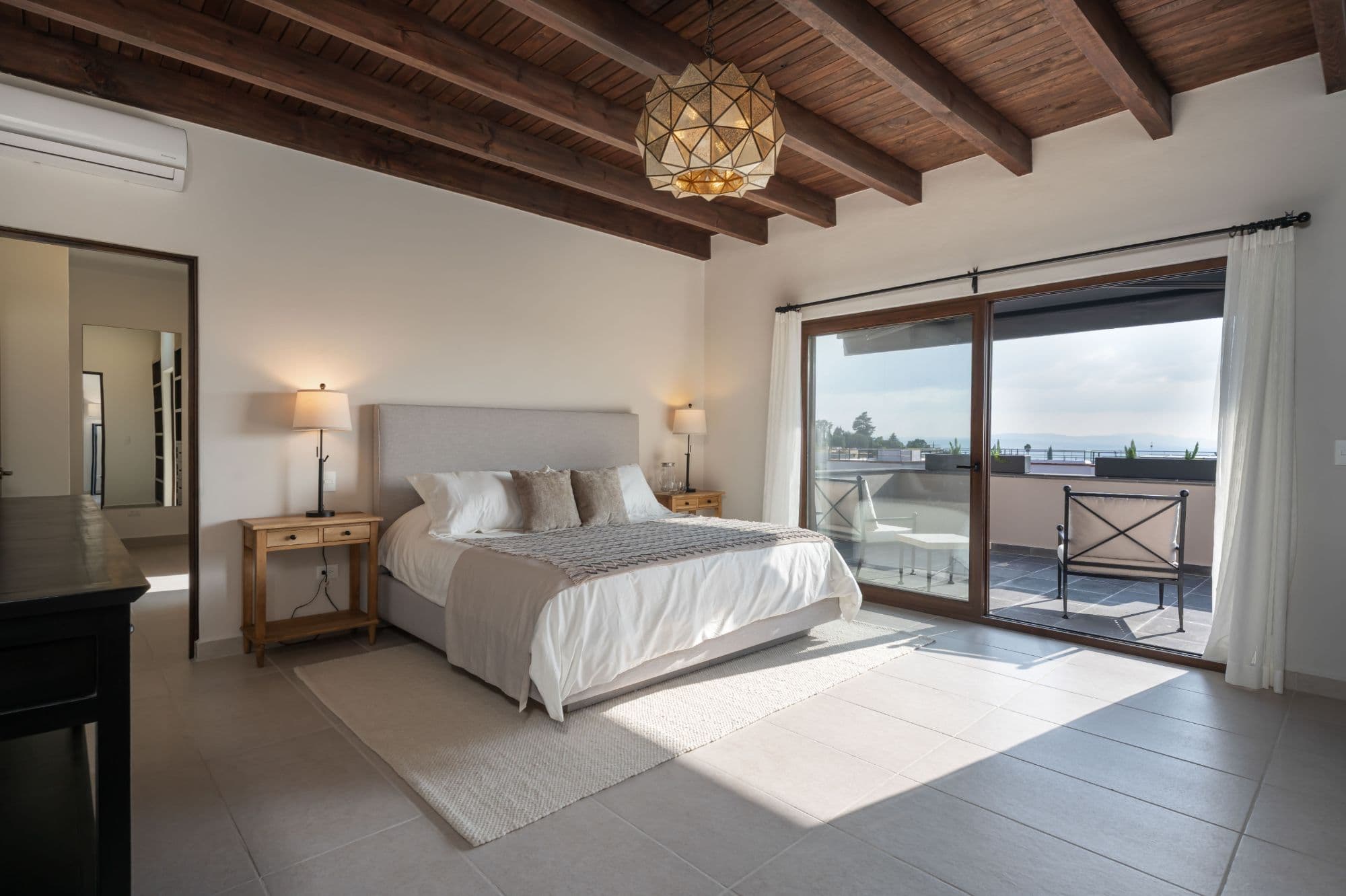 Casa Paulena — Balcones, San Miguel de Allende — photo 25 — serene master suite with panoramic views