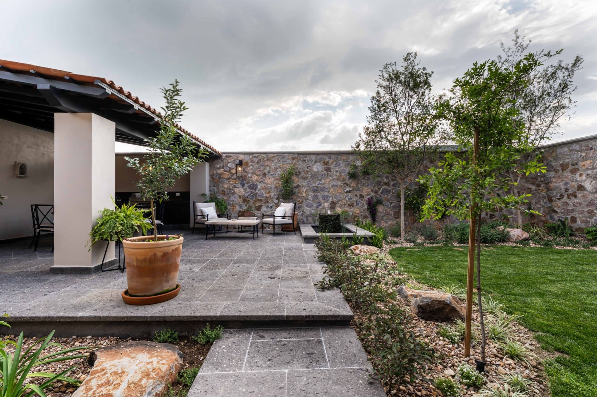 Casa Paulena — Balcones, San Miguel de Allende — photo 36 — sophisticated courtyard, timeless stone elegance