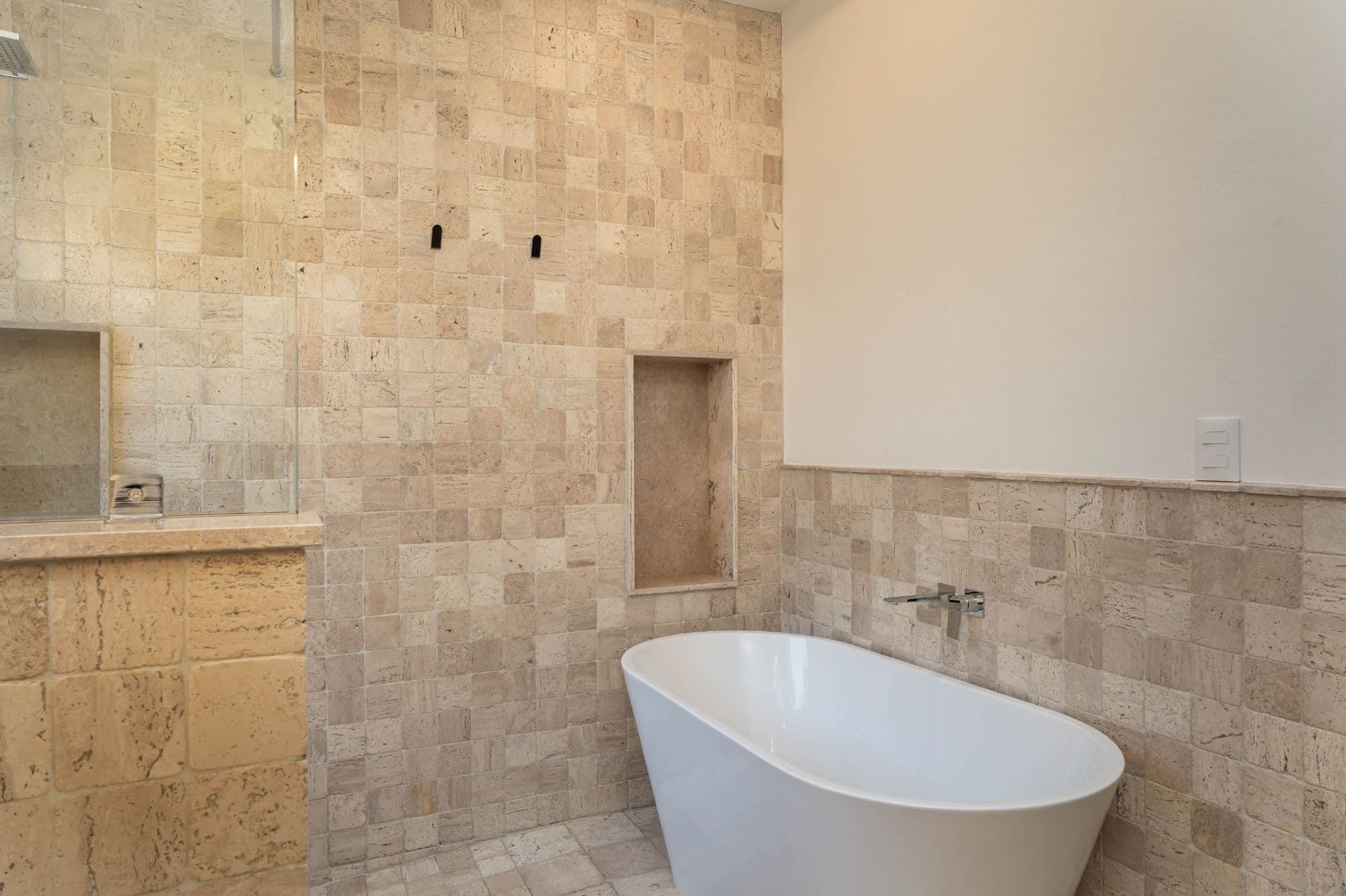 Casa Paulena — Balcones, San Miguel de Allende — photo 18 — spa-inspired travertine sanctuary with soaking tub