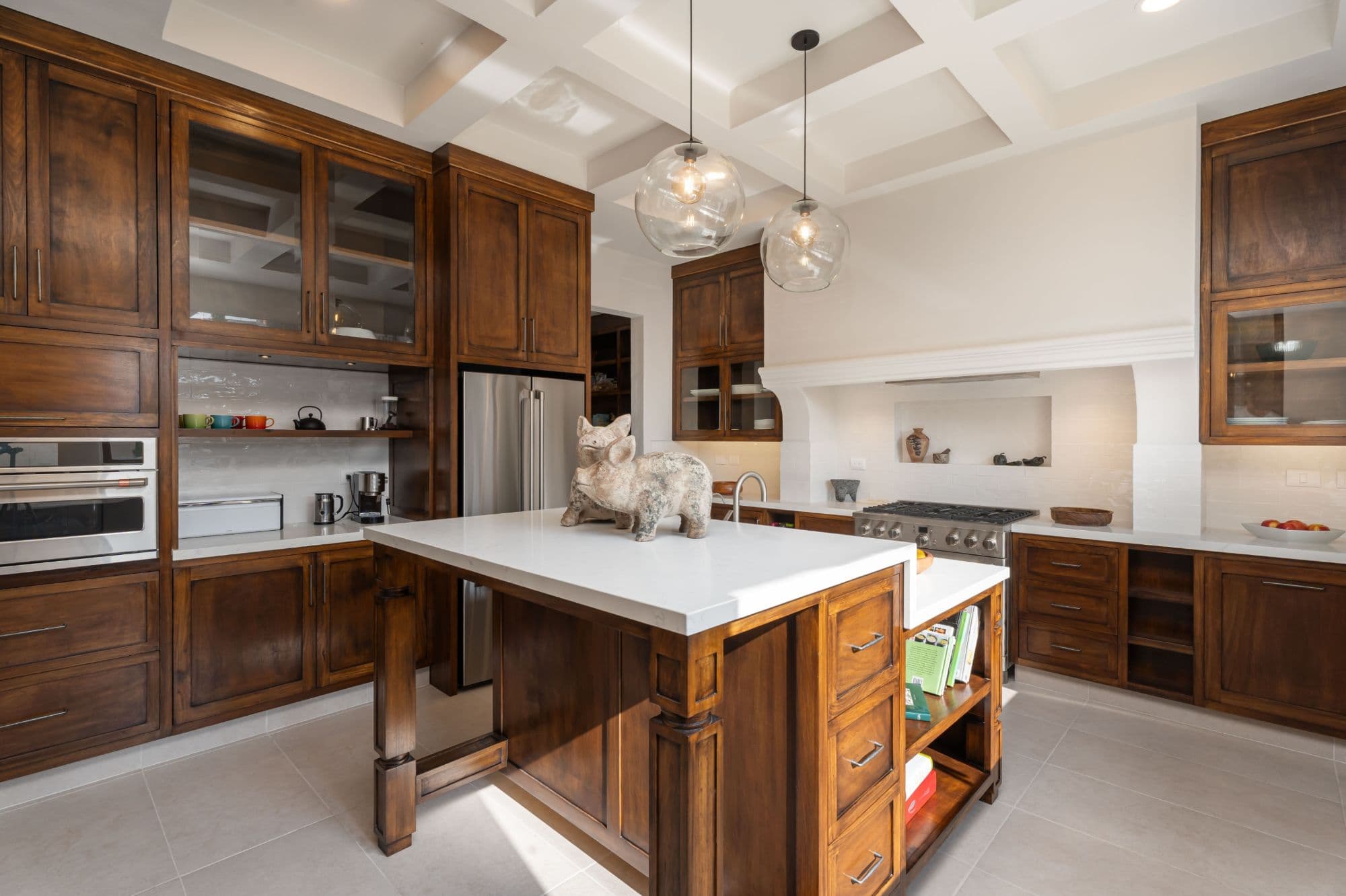 Casa Paulena — Balcones, San Miguel de Allende — photo 8 — sophisticated wood cabinetry, bright culinary elegance