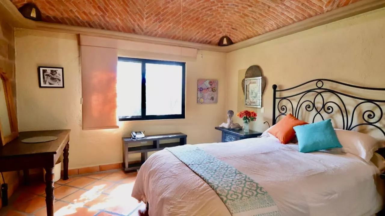Casa Fortuna — Los Labradores, San Miguel de Allende — photo 8 — sun-drenched bedroom, charming rustic elegance