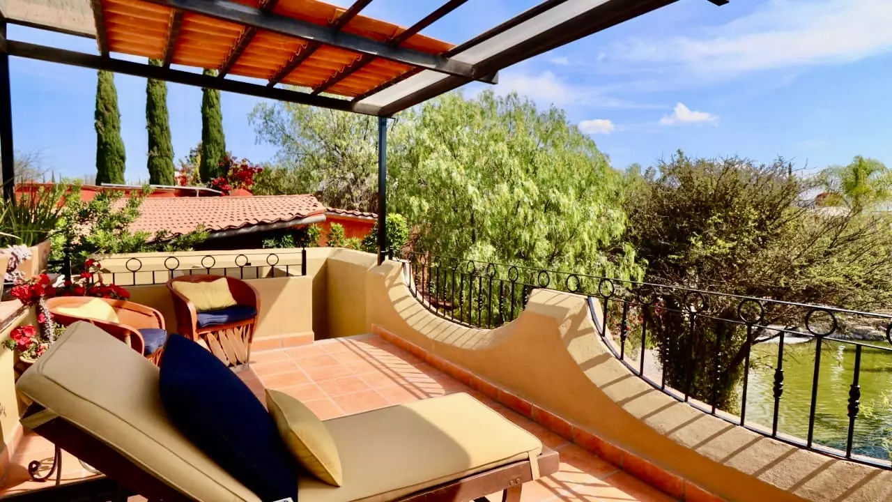 Casa Fortuna — Los Labradores, San Miguel de Allende — photo 12 — sunlit terrace with panoramic garden views