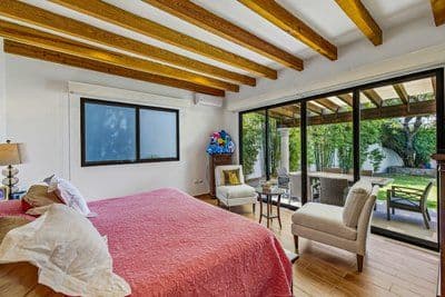 Casa Pial — Centro, San Miguel de Allende — photo 11 — serene bedroom with garden views