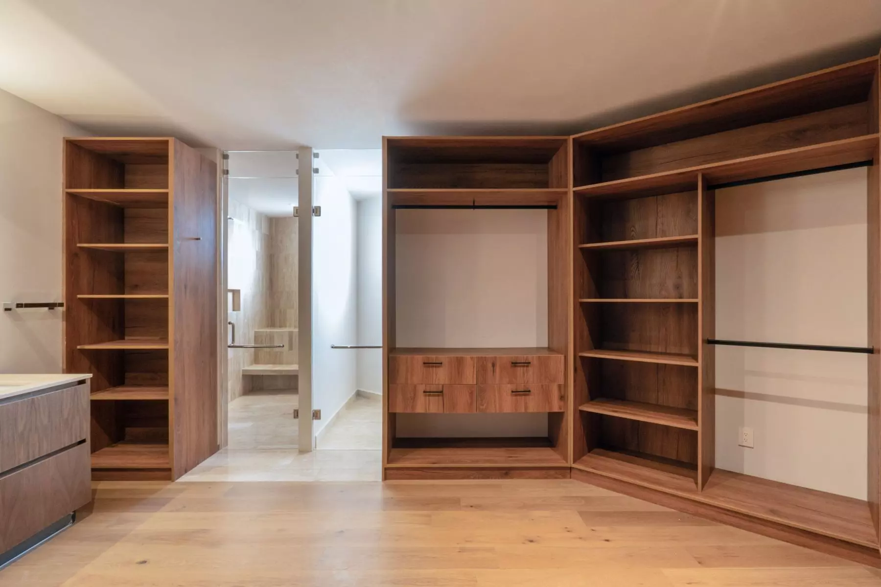 Casa Soñada — Zirándaro, San Miguel de Allende — photo 5 — bespoke walnut closet, luxurious organization