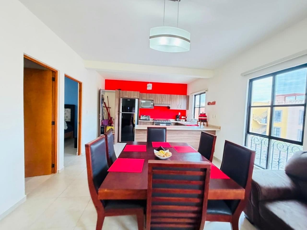 CASA EN CONDO LUNA — Zirándaro, San Miguel de Allende — photo 3 — vibrant open-concept dining kitchen space